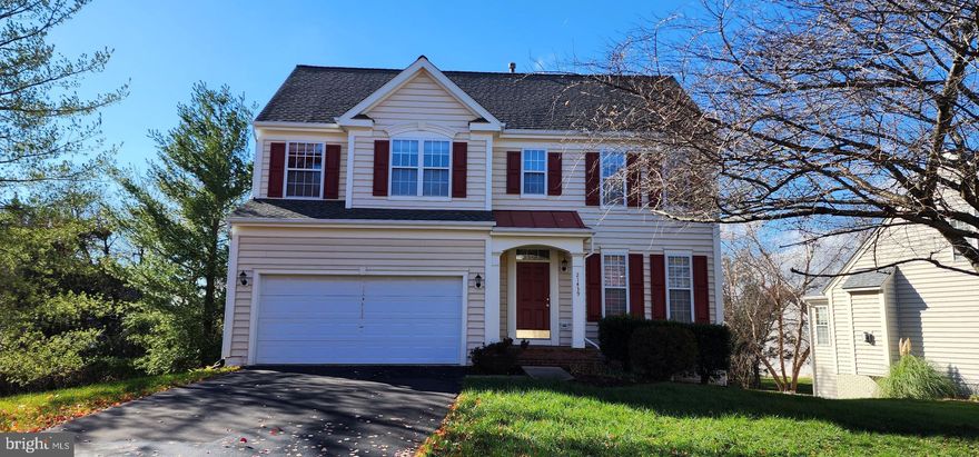 Beautiful and bright single family, over 2600 SF, 4 bedrooms/3.5 baths,  Two story level in the family, with bright 3 sided sun room, freshly painted, 9 ft. ceilings, hardwoods on main level * Kitchen with 42" cabinets, stainless steel appliances, granite countertops *  Formal living room and dining room * Large deck with privacy screen * Gas fireplace in family room * Finished lower level with walkout level to backyard, full bathroom, closets & recessed lighting *  laundry room on upper level * Great neighborhood with many amenities inc. playground/basketball courts, miles of walking paths, and much more.