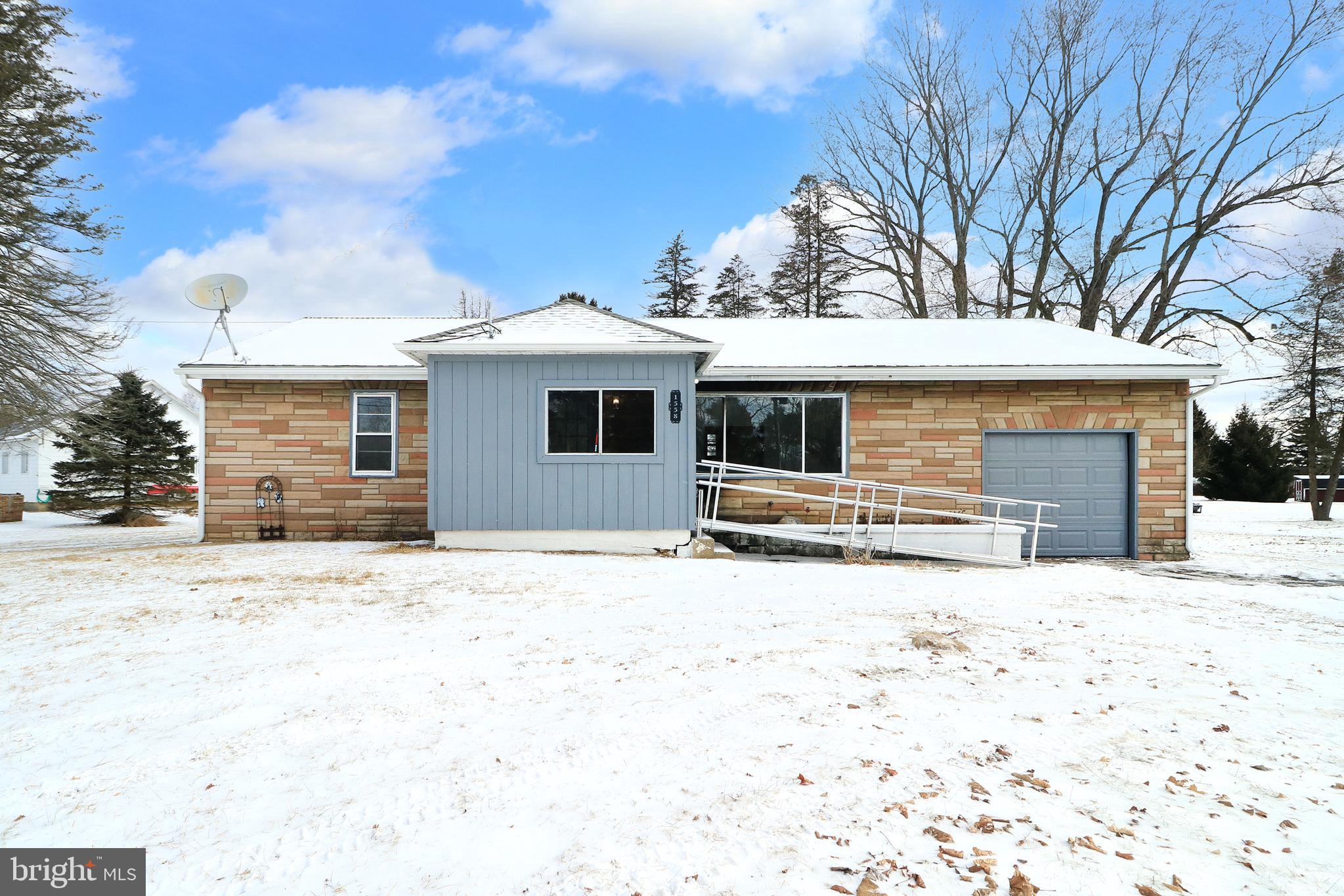 Quaint & Affordable Ranch in West Branch School District! Nestled on .37 peaceful acres, this cute & cozy ranch offers a perfect blend of comfort & convenience. Fresh interior paint enhances the light & bright living room, which features a large picture window that floods the space with natural light, plus a handy coat closet. The spacious eat-in kitchen provides easy access to the rear covered patio, where you can relax and take in the flat, tree-lined backyard. This delightful home features 2 bedrooms & a full bathroom. The full unfinished basement offers ample storage space & convenient Bilco doors leading to the backyard. The attached 1 car garage & detached garage both provide additional storage for vehicles, side-by-sides, or outdoor gear. Additional highlights include oil hot water baseboard heat, pellet stove to help supplement heating costs & replacement windows. Outdoor enthusiasts will love being just 3 miles from the SSRT Black Bear Trailhead, while foodies can enjoy Jackson’s Bar & Grille only 2 miles away. Conveniently located less than 1.5 miles from Interstate-80, this home is just 10.8 miles to Black Moshannon State Park, 31 minutes to Bellefonte, 42 minutes to State College & a quick 21 minutes from Clearfield. Whether you're seeking a full-time residence or a weekend retreat near side-by-side trails, this home & location are the perfect match! Don’t miss this affordable opportunity—schedule your showing today! PROPERTY IS BEING SOLD AS-IS.