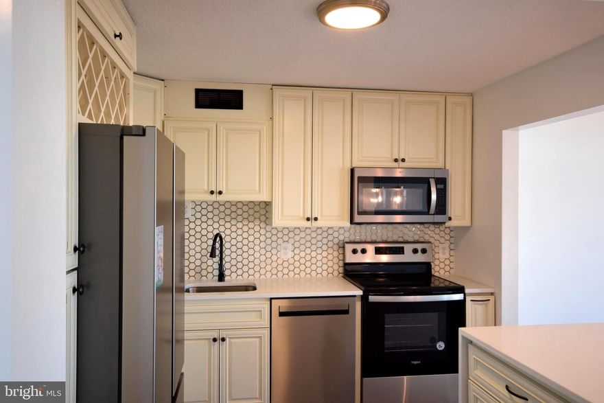 Location, Location, Location.  Rare Opportunity to rent 10th floor  with great views . 3 BR/2 BA with large balcony in McLean House.   totally new windows, New kitchen  with  updated cabinets, and new hardwood  and carpet.  Rent includes monthly condo fee and utilities/amenities, storage.  Close to Metro bus and Silver Line! Outdoor pool, tennis court, exercise room, sauna, controlled access! Updated unit!