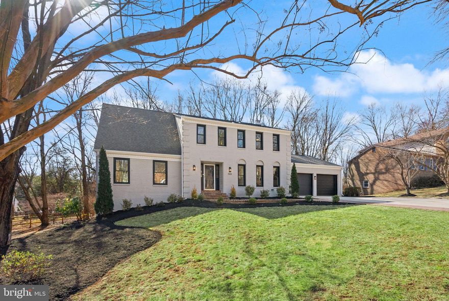Open Sat/Sun 1-3.
Welcome to 1901 Mason Hill Drive, where classic charm and contemporary style come together in perfect harmony. This renovated 6/7-bedroom, 4.5-bath home offers a seamless blend of sophisticated design and thoughtful updates, creating a truly move-in-ready masterpiece. Ideally located just minutes from Old Town Alexandria, this home provides easy access to charming boutiques, fine dining, and the vibrant waterfront.

As you arrive, the stately painted brick exterior and black-framed windows set the stage for what’s inside. A spacious two-car garage offers both convenience and storage, seamlessly integrating into the home’s thoughtful design. Step through the front door into an inviting foyer with sleek wood and metal stair railings, setting the tone for the home’s modern aesthetic.

The heart of this home is the chef’s kitchen, a showstopper with sage green cabinetry, Rejuvenation brass hardware, and luxurious quartz countertops. It offers ample prep space and casual dining options, while a commercial-grade built-in refrigerator and premium appliances ensure effortless entertaining.

Adjoining the kitchen, the open-concept family room features a cozy fireplace, creating a warm and inviting atmosphere. A sunroom with floor-to-ceiling windows overlooks the backyard, offering a peaceful retreat to enjoy the natural surroundings.

The primary suite is a true escape, boasting a spacious layout, large windows, and a spa-inspired ensuite bathroom with a freestanding soaking tub, glass-enclosed shower, and eye-catching patterned tile flooring. The secondary bedrooms are equally impressive, offering generous space and versatility.