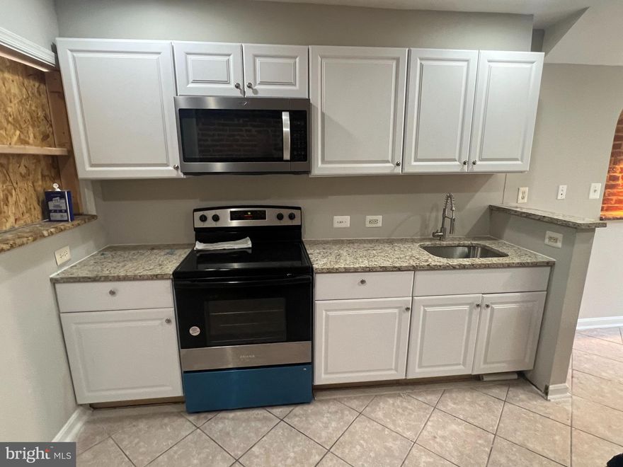 Great Neighborhood in Pigtown is your chance to own a renovated interior unit with 1 Large open concept bedroom upstairs with en-suite bath and exterior deck!  Main level features a fully renovated kitchen with granite counters.  Lower level with full bath, extra storage, 3 new mini splits.   A Must See for homeowners or Investors.