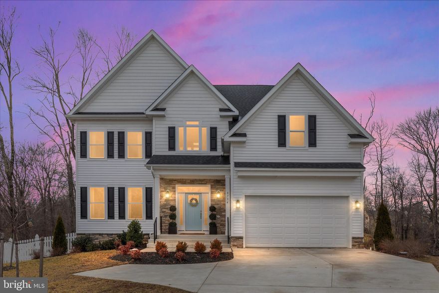 **Don’t miss the Open House this Sunday, March 15 from 1–3 PM. Come take a tour and see why this home is a must-see.** Welcome to this stunning and rarely available St. Philip model, offering over $240,000 in premium upgrades and located in the highly sought-after Brandy Woods subdivision. Thoughtfully designed for modern living, this exceptional home is situated on a premium lot backing to a forest nature reserve for ultimate and lasting privacy. Featuring 4 bedrooms, 5.5 bathrooms, a 2-car front-load garage, and a fully finished walkout basement, this home is the gem of Mount Vernon. The outdoor living spaces are truly extraordinary. Enjoy a spacious Trex deck, a beautifully designed hardscape flagstone patio, a wood-burning fireplace with a custom stone wood box, hot tub, and a fully fenced backyard with classic white pickets that is perfect for relaxing or entertaining under the stars.
Fewer than three years young and showing like a model home, this meticulously landscaped property offers impressive curb appeal and over 5,300 square feet of impeccably maintained living space.
Step inside to a grand foyer highlighted by an elegant staircase. The main level features a formal sitting room with a decorative fireplace imported from England, a formal dining room with coffered ceiling and custom trim, a private office with book shelves with enchanting forest views, a powder room, and an expansive great room filled with natural light from a stunning wall of windows and a cozy gas fireplace with mantel. The gourmet kitchen is a true showpiece, complete with stainless steel appliances, a gas cooktop, built-in microwave, wall oven, quartz countertops, custom white cabinetry, an impressive tile backsplash, and a large center island with bar seating which is ideal for everyday living and entertaining.
Upstairs, retreat to the luxurious primary suite featuring two customized walk-in closets and a spa-inspired bath with an oversized soaking tub, spacious frameless glass shower, and dual vanities. The Princess Suite offers its own private en suite bath, perfect for guests. Bedrooms three and four are generously sized and each include their own private en suite bathrooms, providing exceptional comfort and convenience. A spacious upper-level laundry room with custom white glass cabinetry and a utility sink ensures elevated living. The fully finished lower level is designed for entertaining, offering a large recreation room, full bathroom, and a separate legal unfinished bedroom with ensuite bathroom and proper egress that can easily be completed to suit your needs. Walkout access leads directly to the flagstone patio and is the perfect setting to unwind and enjoy beautiful sunsets. In addition, the garage is wired for an EV charging station. Enjoy the lifestyle and consider membership at Mount Vernon Country Club, offering private dining, pool access, social events, and golf memberships. The home is conveniently located within walking distance to grocery stores, restaurants, and shops, and with future expansion plans to add a Metro nearby.  This is a rare opportunity to own a truly exceptional home in a prime location. Schedule your private showing today. You do not want to miss the chance to make this your forever home!