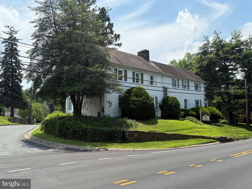 Incredible development opportunity in the heart of New Britain Borough. 10 Beulah Road offers a rare combination of location, zoning flexibility, and buildable land with strong frontage and visibility. The property spans 2.44 acres and features a freestanding commercial building measuring just over 7,500 square feet. Positioned on a corner lot with frontage on both Route 202 and Beulah Road, this site benefits from exceptional exposure and access, ideal for future residential or mixed-use development.

Zoned C-3 Office Commercial with a Mixed-Use Overlay, the property supports a wide range of potential uses, including residential, commercial, and mixed-use configurations. The building is currently occupied by month-to-month commercial tenants, allowing flexibility for redevelopment or holding income during the planning and entitlement process. Copies of leases, building sketches, and an estimate for public water hookup are available upon request.

The seller has conceptual site plans and sketches illustrating the maximum density of townhome units that may be achievable under current zoning — an ideal starting point for builders and developers looking to enter the highly desirable Doylestown-area market. With its location just minutes from downtown Doylestown, Delaware Valley University, and major commuter routes, this site is exceptionally well-positioned for long-term growth and development.
