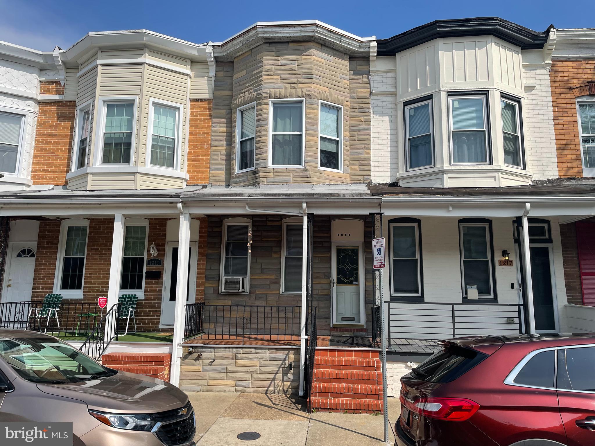 Lovingly maintained home with all its original charm. Great opportunity for an investor or someone to live in and update. 14 ft. wide porch front house on 1 way street. Easily add parking. Original wood floors under carpet & high ceilings on 2 floors. Large kitchen with tin ceiling. 2nd floor features a primary bedroom w bump out bay window, 2 skylights, multiple transoms. Full basement is about 6ft. high.