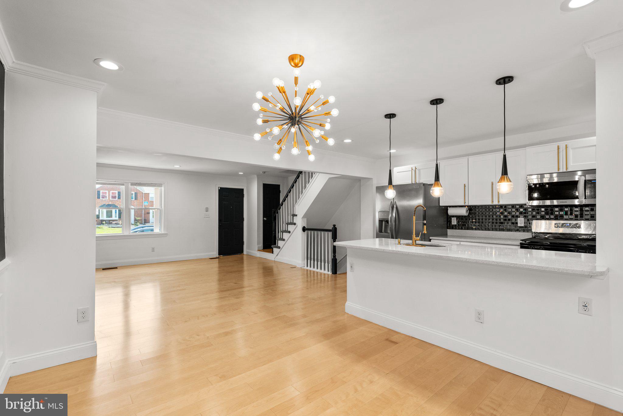 Welcome to this beautifully renovated 5-bedroom, 2 full bathroom townhouse located in desirable Loch Raven community. This spacious home features a modern open-concept layout with fresh paint, brand-new carpet, and stylish updates throughout. The kitchen boasts granite countertops, new appliances, pendant lighting, and elegant crown molding, making it a perfect space for cooking and entertaining. Enjoy two fully updated bathrooms with contemporary finishes and generously sized bedrooms offering ample space for family, guests, or a home office. The finished basement adds incredible versatility, featuring two bonus rooms ideal for a gym, playroom, or additional living quarters. Conveniently located near shopping, dining, parks, and major commuter routes, this move-in-ready home combines ample space with style. Don’t miss this exceptional opportunity to make this home your own!