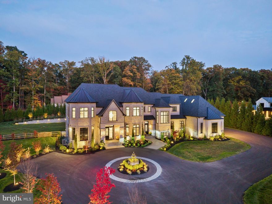 Welcome to Le Château, an extraordinary newly constructed estate within the prestigious gated enclave of Castanea Estates. Poised on 2.2 acres of manicured grounds, this extraordinary residence offers over 14,000  square feet of masterfully designed living space, where modern elegance meets innovation.  
Step through grand double doors into a soaring foyer crowned by double-height ceilings and a glass floating staircase with automated lighting. Every detail in this exquisite home exudes sophistication and the contemporary light fixtures throughout the house are works of art.  A stunning 12-foot porcelain dining table imported from Spain anchors the dining room, designed for  family and friends to gather and enjoy the sunset view out the windows. The living room focal point is a  glass linear fireplace that offers warmth as well as architectural interest.   The heart of the home is a culinary showpiece kitchen, featuring Wolf appliances, a True see-through refrigerator, Miele built-in coffee station, Lumitaj quartz counters, three dishwashers, two wall ovens, warming drawer, full size wine fridge, butler’s pantry, and walk-in pantry with custom shelving and storage.  The main floor also features two executive home offices, one with unique circular library stairs and one with built-in bookcases.  A bedroom and full bath on the main floor are ideal for the privacy of your guests.   The upper level primary suite is the owner’s private retreat – featuring its own fireplace, a spa-inspired bathroom with imported Spanish tile, soaking tub, and en suite hair salon. Dual custom closets offer ample space for wardrobes and storage, and include a one-of-a-kind Chanel-inspired closet and dressing room.  The lower level redefines relaxation and fun with a 12-seat Dolby home theater, multiple themed bars (Mezcal, Tequila, Scotch & Bourbon), an 800-gallon live coral aquarium, infrared sauna with red light therapy,  poker table, and fitness center. An advanced golf simulator also includes a sports package and kids games. In this incredible property, outdoor living is equally inspired. Enjoy the heated pool and spa, a welcoming firepit lounge, trellised entertaining area, putting green, and maintenance-free turf, all framed by 80+ Green Giant Arborvitae for ultimate privacy.  The pool house offers full guest accommodations, and the 4-car garage and driveway  together accommodate 19 cars,  perfect for entertaining friends and family throughout the year. Listen to music inside and out with the fully integrated sound system. Additional highlights include a Savaria Vuelift glass elevator,  security systems, and hardwired cameras.  A thoughtful blend of artistry, technology, and sophistication, Le Château is more than a home, it’s a sanctuary  of refined luxury and modern living at its most exceptional.