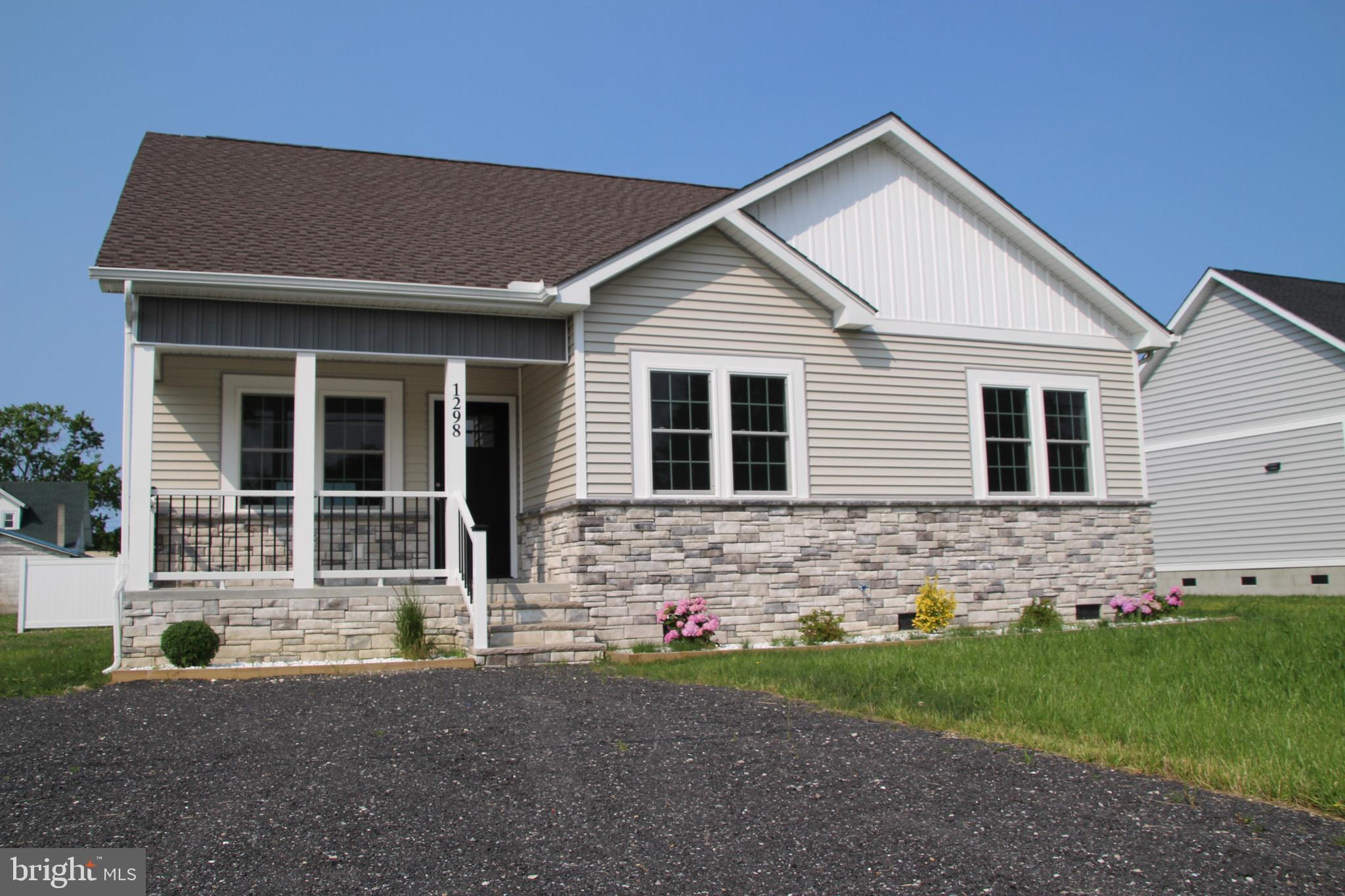 Brand New Construction! Move-in Ready. UP TO $6000 TOWARDS BUYER'S CLOSING COSTS. Enjoy the conveniences of In-Town living in this beautiful home built by a local builder with a long-standing reputation for outstanding Quality. Open-plan Kitchen/Dining and Living Room area. Brand new Whirlpool appliances. Large master suite with large walk-in closet and spacious master bath featuring marble double-bowl vanity sinks and custom tile shower. Bedrooms 2 and 3 both feature generous closet space. High Efficiency Windows, Insulation and Appliances. Custom Stone-work on the front exterior of the home give a classy touch. Enjoy sitting on your covered front porch, or grilling and relaxing on your back deck constructed of maintenance-free Azek composite decking. Brand new sidewalks were also built with this home, and there is also the option of both off-street and on-street parking. This home is in a central location close to many amenities and services (Fire Department, EMS and Police) as well as shopping, restaurants, pharmacies and schools.
