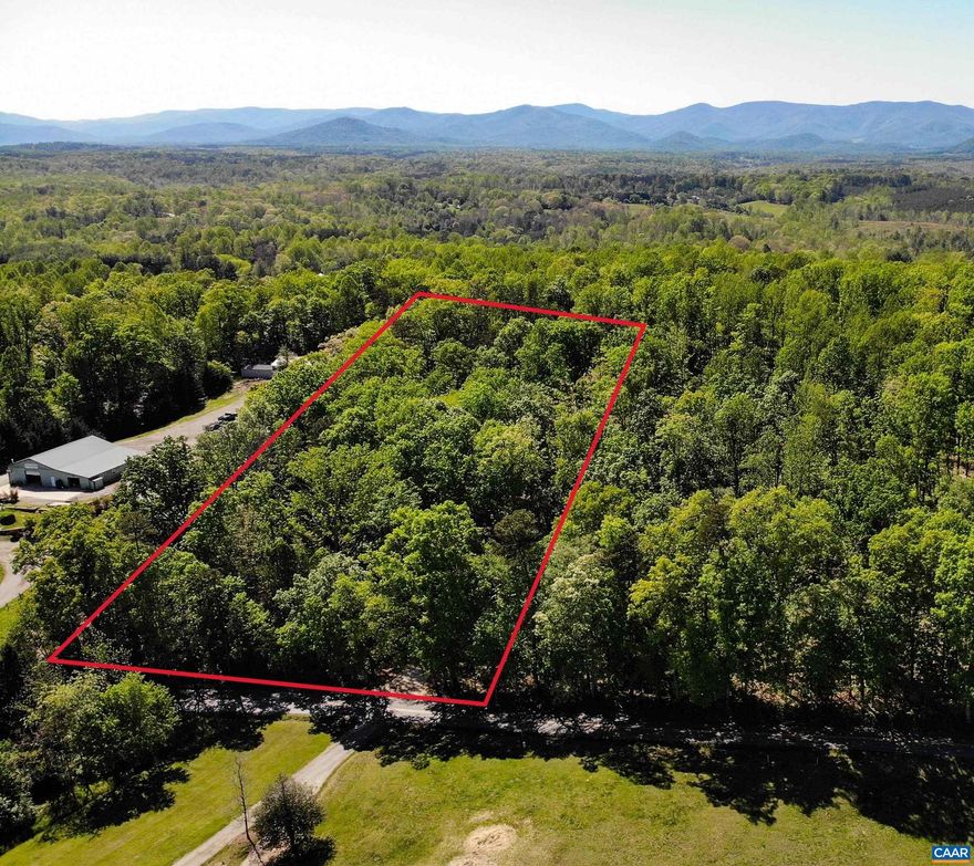 Gorgeous setting with mature trees on this wooded lot, seasonal Piney mountain views. Complete privacy but only 15 minutes to Hollymead Town Center. 4 bedroom Conventional drain field approval. Driveway stubbed in. (Large Rocks blocking the entrance will be removed this week.) Underground power already install to the property. Mild C&R's in place. Custom home package also available (See MLS #663619).