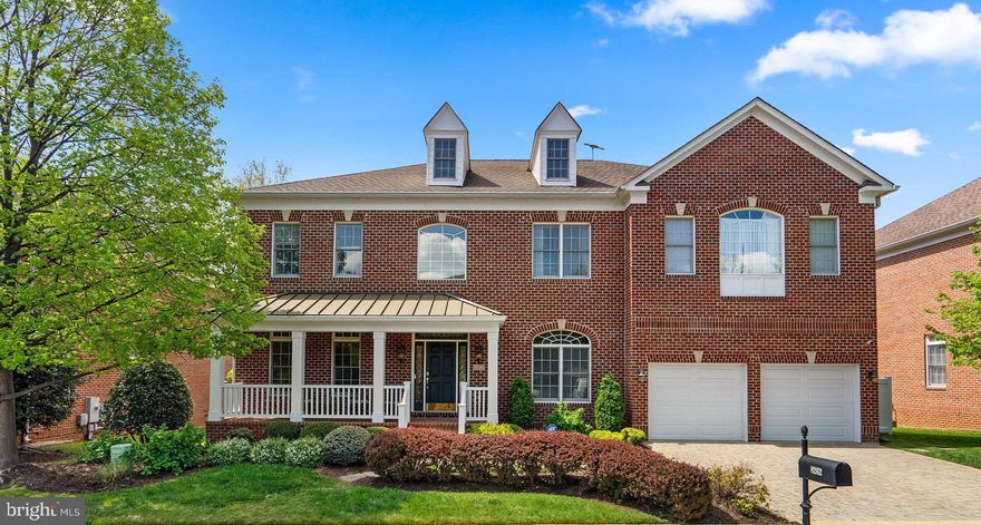 Located in the heart of Tysons Corner, this stunning brick Colonial offers unparalleled elegance over three fully finished levels and approx. 6900 sq ft. of living space! With five bedrooms, 4 full baths/2 half baths and a 2-car garage, the stage is set for luxury living. Step inside to the grand two-story entry foyer and note the impeccable craftsmanship and attention to detail with hardwood floors, tray ceilings, and wide custom moldings throughout. The main level boasts a formal living room and banquet-sized dining room with a butler's pantry that includes a beverage refrigerator. You’ll love entertaining and cooking in the chef’s kitchen featuring high-end cherry cabinets, a Viking gas stove, 2 dishwashers, 2 sinks, an island seating space, an extra-large pantry and breakfast area that overlooks the rear garden. The family room is light and bright with a wall of windows and a cozy gas fireplace and access to a large private office for a great work from home space. Upstairs, the expansive primary bedroom suite is a sanctuary complete with a large sitting room, coffee bar with mini-fridge, large his and hers custom closets, and a luxurious ensuite bathroom. Three additional bedrooms on this level include two with a jack and jill bathroom and another with its own ensuite. The lower level is an entertainer's dream with a large recreation room featuring a gas fireplace, full wet bar equipped with a wine fridge, a media room, an exercise room, and a convenient powder room. The 5th bedroom is located on this level with its own ensuite bath making it the perfect guest space. Other features include several large storage closets and a garage with shelving options. Outside, the professionally landscaped backyard with low-maintenance fencing, a stone patio and a front porch extends your living spaces. Enjoy community green spaces including the neighborhood gazebo or the lawn area perfect for a game of soccer or walking the dog. Located just off Leesburg Pike and Gallows Rd, walkable to shops and restaurants. From here it’s just minutes to Tysons Corner Center, I-495, three Metro stations, multiple restaurants and shops, three Whole Foods stores, Trader Joes and everything else.