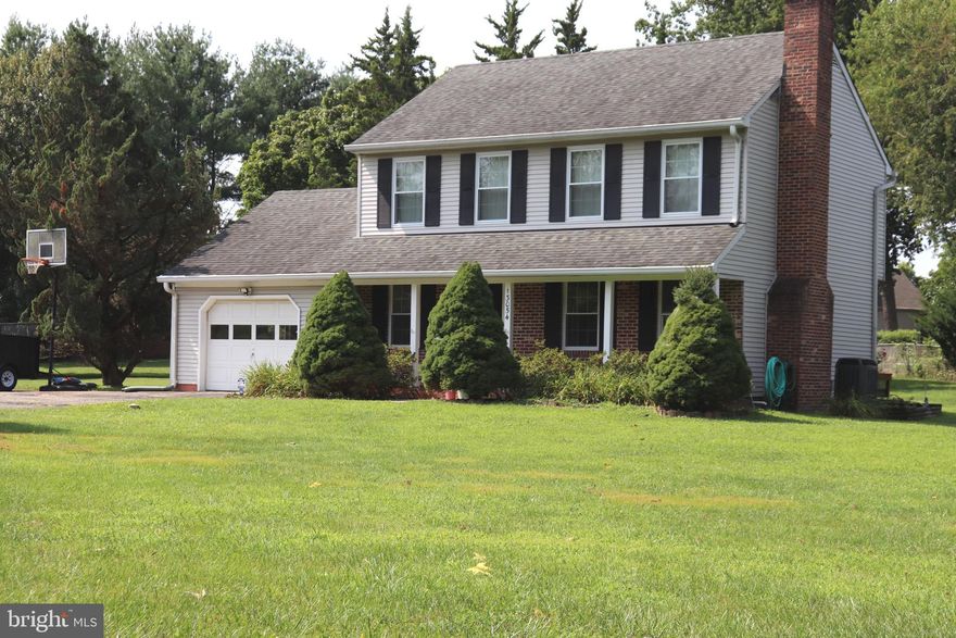 Welcome Home!!! Agents please don't let your deserving clients miss out on this lovingly maintained Colonial.  This wonderful & inviting home is situated on a .55 acre treelined lot; located in sought after Berrymans Hollow.  Home is being Sold As-Is.  Home Warranty included.   Living Room with Hardwood Flooring and Wood Burning Fireplace, Primary Bedroom with Full Bath,  Upgraded Kitchen with Granite Counter Tops, Ceramic Tile Flooring, Black Appliances, Upgraded Cabinetry & Sliders which leads to an Oversized Deck.  Sellers have made many upgrades in  recent years which includes: Newer Roof, Carpet in Upper Level Bedrooms,  Freshly Painted Throughout, Ceramic Tile in Entry Foyer & Hot Water Heater.   Finished Lower Level with powder & laundry rooms.  Level yard is perfect for entertaining.  Make an appointment to view today, you won't be disappointed!!!