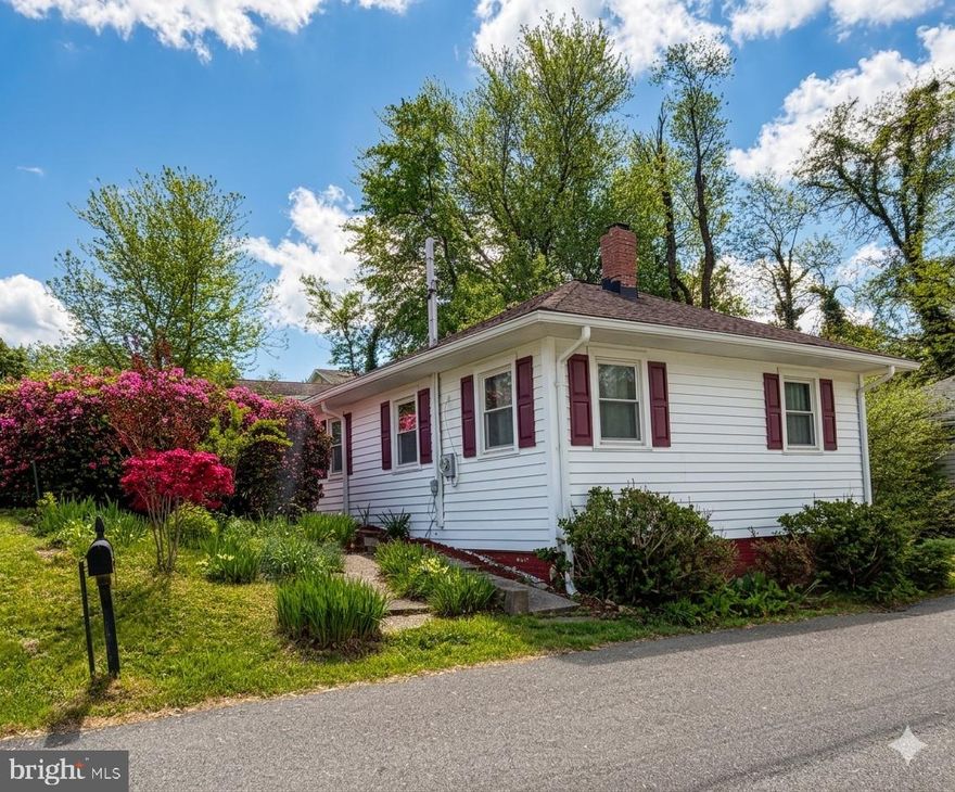 Seize the rare opportunity to own a charming bungalow just a few short blocks from the tranquil waters of the Chesapeake Bay. Situated on a coveted double corner lot, this property is the perfect canvas for a dream home without the worry of major structural stress.

Peace of mind starts here: nearly every big-ticket item has been professionally updated. The foundation was completely redone in 2023, providing a rock-solid base. In that same year (2023), the house received all-new siding, a gorgeous, professionally remodeled kitchen, and all-new ductwork for maximum efficiency. The roof and windows are approximately 10 years young, and the HVAC system was replaced only 4 years ago.

This isn’t just a house; it’s a property with room to grow. The beautiful, expansive lot offers true privacy and space, complemented by a large, detached 2-car garage—perfect for a boat, vehicles, or a workshop.

While the inside awaits your final cosmetic touches to make it shine, all the heavy lifting and major expenses are done. Move right into a worry-free home and focus on the fun part - making it your own! If you have been looking for the ultimate mix of coastal location, space, and a structurally sound property, this is it.