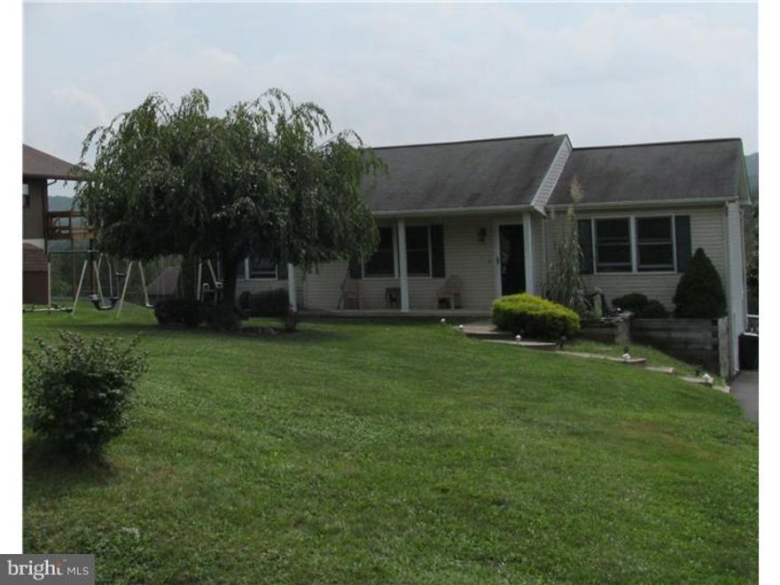 This 4 bdrm, 3 bath ranch home offers everything & the kitchen sink, one floor living, master bdrm with full bath, 2 bdrms on opposite side of home w additional full bath, 26 handle kitchen w beautiful tiled floors, dining rm w double glass doors to large deck w views of the mountains in the background, large L.R. with coat closet, finished basement offers 23'x30' family rm with ventless propane fireplace, full bath, another bdrm or use as office, an additional 10'x19' space to use as toy area, game area, etc with double glass doors to fenced in backyard with above ground pool & so much more, a must see home, Motived Seller