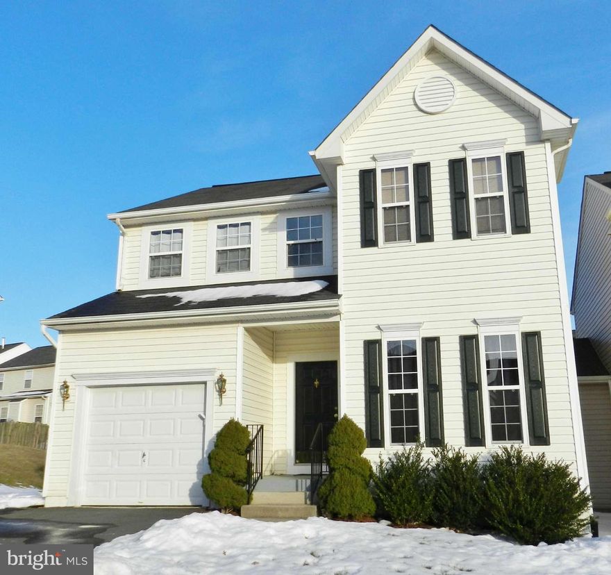 Gracious End Unit=extra space -Semi-Detached Home! All recently renovated perfectly ready to become your home without doing a thing! Main Level Open design w/ Gas Fireplace in Family room. Pantry closet in Kitchen. Upper level w/ spacious Bedrooms & Laundry Room w/perfect location.  The lower level is improved w/rough-in bath, heat/ac ready  to finish your way! Garage w/opener PLUS Home Warranty!