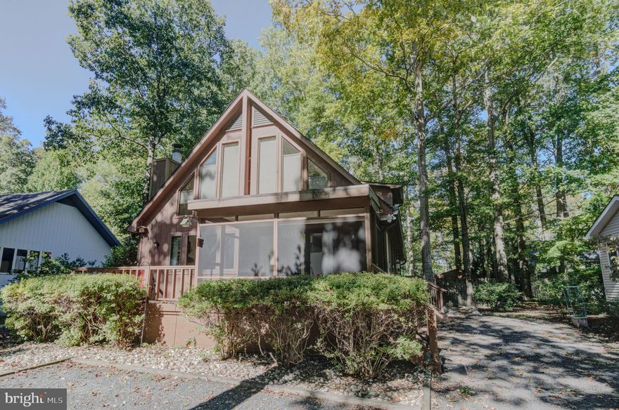 NEW PRICE! Welcome to your new place to live and love life that just got more affordable! Classic Chalet-style A-Frame with 4 bedrooms and 3 full baths. 2 Primary bedrooms- one up and one downstairs both with primary bathrooms. Delightful screen porch plus a deck for outdoor enjoyment. Great room has 2-story vaulted ceiling to invite you inside. New Heat pump plus a zoned Mini-split unit in downstairs Primary Bedroom and bath done in 1987 by Brunori Builders.  Electric Fireplace in Living Room. New roof in 2023. This property needs some TLC and updates, but good bones (Built by E. S. Adkins and Co) make this your forever home or new second home at the ocean. On a Cul de sac street close to Somerset Park.  12x10 Detached shed.  Seller will consider $10,000 closing cost or decorator allowance for an acceptable offer. Easy to see.