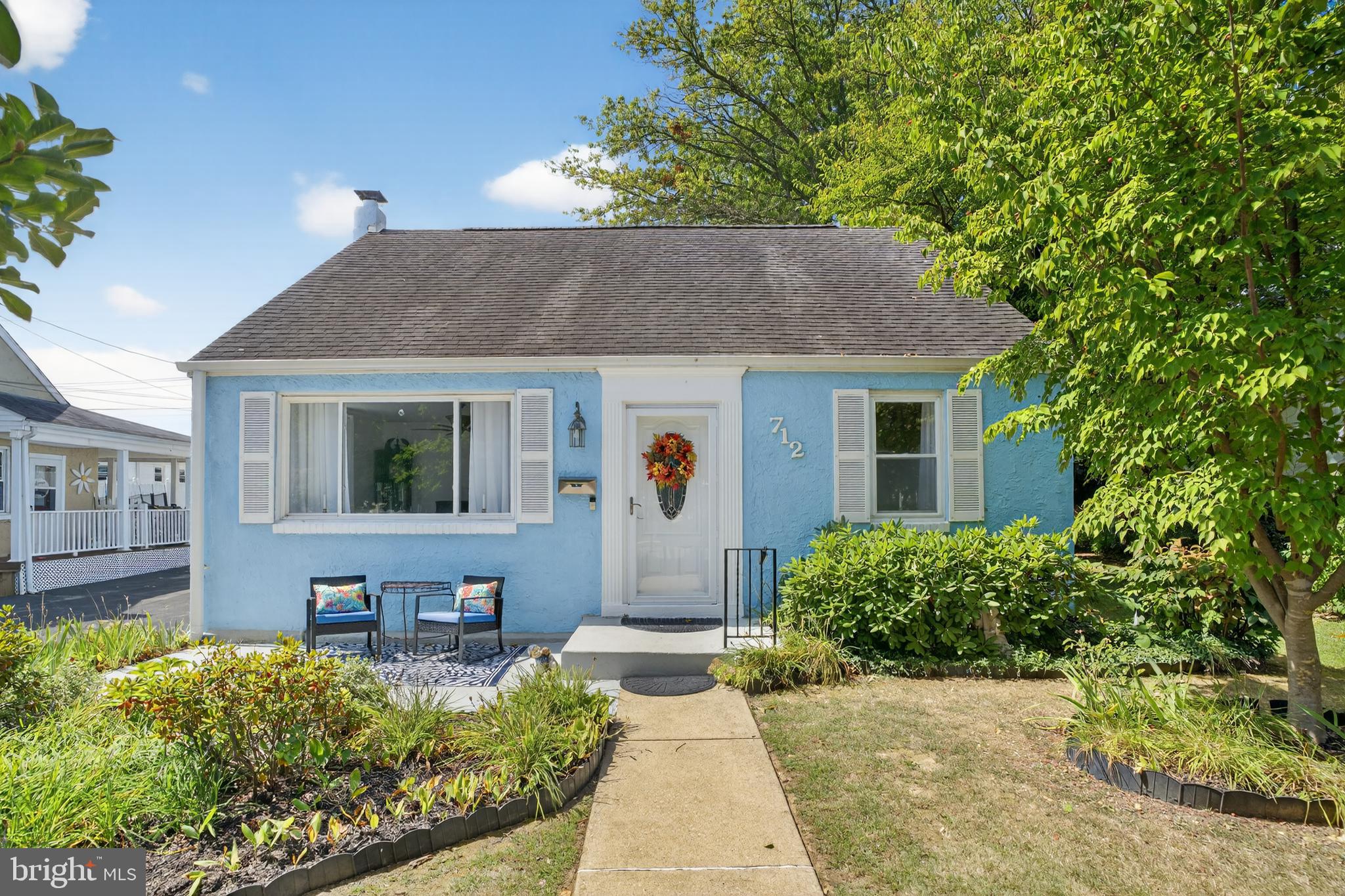 "Welcome Home" to this adorable Cape Cod surrounded by beautiful perennials that bloom through out spring and summer . Entering the front door is a large living room with a staircase that separates it from the formal dining room. This home has hardwood floors throughout. The living room has a ceiling fan and lots of bright sunlight from the large window that faces the front exterior and a side window . Adjacent to the living room is a formal dining room with 2 windows and a coat closet. There are two entrances to the hallway from the dining room or living room with the kitchen to your left and a den or 3rd bedroom to your right. In between is a beautiful full bath with a tub.The kitchen has a side door that leads out to the driveway . It has stainless appliances, a ceiling fan and a ceramic tile floor. The den/3rd bedroom has a closet and also a door that leads out to the sun porch.
The 2nd level has a primary bedroom with 3 windows, 2 closets and a half bath with a laundry area . The 2nd bedroom is across the hall that is used as an office.
The basement is unfinished and dry due to a french drain that was installed .It also has plenty of room for all your storage needs. The Hot Water Heater was installed in 2022. The furnace has an annual service contract that can be transferable.The backyard is fenced and has a cement patio for your outside dining and entertaining. There is also an enclosed sun porch that tops off your serene relaxing time with family & friends.
This home is situated on a very desirable and quiet street with a lot of children bustling around.It is located in Morton and Ridley School District.
Come see this quaint and well loved move in ready home and call it your "Home Sweet Home."