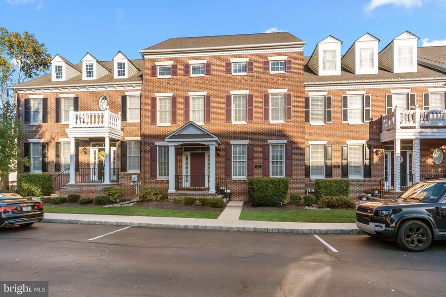 Welcome to this beautifully renovated townhome in the prestigious Newtown Walk community — a complete top-to-bottom transformation.
From the moment you step inside, you’ll feel the difference. Every detail has been thoughtfully designed, with wide-plank custom white oak hardwood floors, crown molding, custom wainscoting, and recessed lighting setting an elegant tone throughout the main level. The living and dining rooms feature in-ceiling speakers, creating the perfect atmosphere for entertaining or relaxing evenings at home.
The stunning re-designed kitchen is the heart of the home, new custom cabinetry showcasing quartz countertops with waterfall edges, Hudson Valley pendants, under cabinet lighting and beautiful designer hardware. New  appliances, include a JennAir 5-burner gas cooktop, Rohl faucet, KitchenAid ice maker, and wine and beverage refrigerators—every element designed for both beauty and function.
All four bathrooms have been completely transformed with quartz and quartzite countertops, new cabinetry, glass shower enclosures , designer fixtures, porcelain flooring and marble shower flooring in the primary and secondary baths. The powder room has also been stylishly reimagined.
The laundry/mudroom is as functional as it is beautiful, featuring shiplap walls, cabinets, hooks for storage, a brand-new washer and dryer, and direct access to the two-car garage equipped with a Tesla charger and utility sink.
Step outside to a private composite deck, perfect for entertaining, complete with a gas grill connected directly to the home’s natural gas line—so you’ll never run out while hosting family and friends.
Upstairs, the primary suite offers a serene retreat with two custom walk-in closets and a spa-inspired bathroom. Two additional bedrooms -one with a custom walk in closet -share a double-vanity quartz bathroom  and the third floor offers flexible space for guests, a home office, and a media room with its own full bath.
Just a short stroll to downtown Newtown Borough, enjoy boutique shopping, fine dining, and a true sense of community. With exterior maintenance, lawn care, and snow removal handled for you, life here is as effortless as it is beautiful — in the award-winning Council Rock North School District.