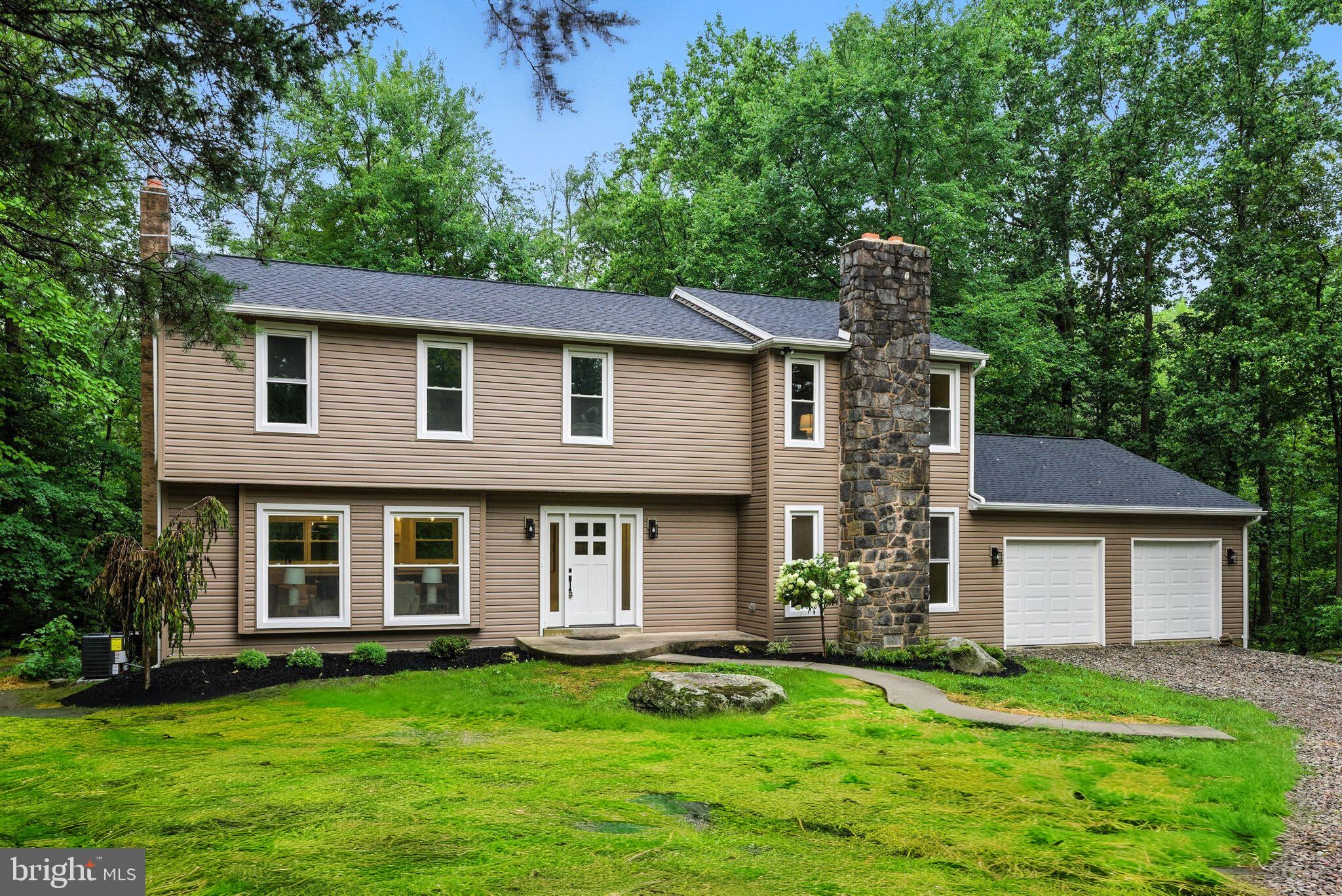 Expansive Colonial with Modern Updates and Private Wooded Setting. Welcome to this beautifully updated colonial, perfectly nestled on a wooded lot offering peace, privacy, and a warm sense of home. Designed for both everyday living and effortless entertaining, this property combines timeless charm with modern updates in an open, inviting floor plan.
Step inside to a spacious kitchen and dining area that immediately welcomes you. The stunning kitchen boasts abundant cabinet space with pullouts, soft-close drawers and doors, quartz countertops, a farmhouse sink, and brand-new stainless steel gourmet appliances. A massive island with seating for up to eight anchors the space — perfect for gatherings. The adjacent dining or sitting area features a cozy gas stove with a brick hearth, adding warmth and character.
From the bright breakfast area, enjoy views of the rear synthetic deck and the tranquil wooded backdrop. The large family room offers soaring ceilings, a wood-burning fireplace with a brick hearth, and a rustic beam mantle — the ideal setting for relaxing or entertaining. A functional mudroom just off the garage entry serves as the perfect drop zone for everyday essentials.
Upstairs, escape to the owner’s suite — a true retreat featuring a brick accent wall, walk-in closet, and picture windows overlooking the private backyard. A sliding barn door leads to the beautifully appointed main bathroom. The second floor also includes three additional bedrooms, a full hall bath with a tub/shower combo, and a conveniently located laundry room. The finished basement, with exterior access via Bilco doors, provides even more space for work, play, or hobbies. The basement was professionally waterproofed with a transferrable lifetime warranty to the new owner.
With a new roof, siding, windows, luxury vinyl plank flooring, fresh paint, hot water heater, two-zone HVAC, and updated fixtures, this home is truly move-in ready. All inspections have been completed and are available to view. All this in a fantastic location — just minutes from Green Lane Park and the Perkiomen Trail. Don’t miss the opportunity to make this exceptional home yours! PA Licensed Broker has ownership interest in property.