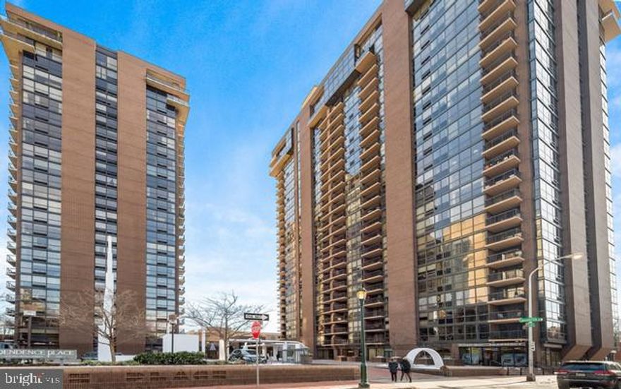 Somewhere between a one-bedroom and a two-bedroom lies the perfect floor plan—and this thoughtfully designed residence delivers just that. Step inside this spacious one-bedroom plus alcove home, featuring 1.5 bathrooms and an open, airy layout ideal for modern living. The kitchen has been fully opened and extended, creating a seamless flow and offering ample flexibility for a dining table of any size. The combined living and dining area is notably wider than most in the building, enhancing both comfort and entertaining space, while also extending to an extra-wide, sun-drenched south-facing terrace overlooking the charming Society Hill gardens. Just off the entryway, you’ll find a convenient half bath and a private in-unit laundry room. The versatile alcove—perfect as a den, home office, or additional dining space—leads to a generously sized primary bedroom featuring a corner window, two closets, and a beautifully renovated en-suite bathroom with a large stall shower. Independence Place, a highly regarded condominium located on Washington Square Park, offers an array of desirable amenities including a newly added fitness center, an outdoor seating area with bike storage, a dedicated cold storage room for deliveries, and a convenient front plaza for short-term drop-offs and pick-ups. A garage beneath the building provides monthly parking options for an additional fee.