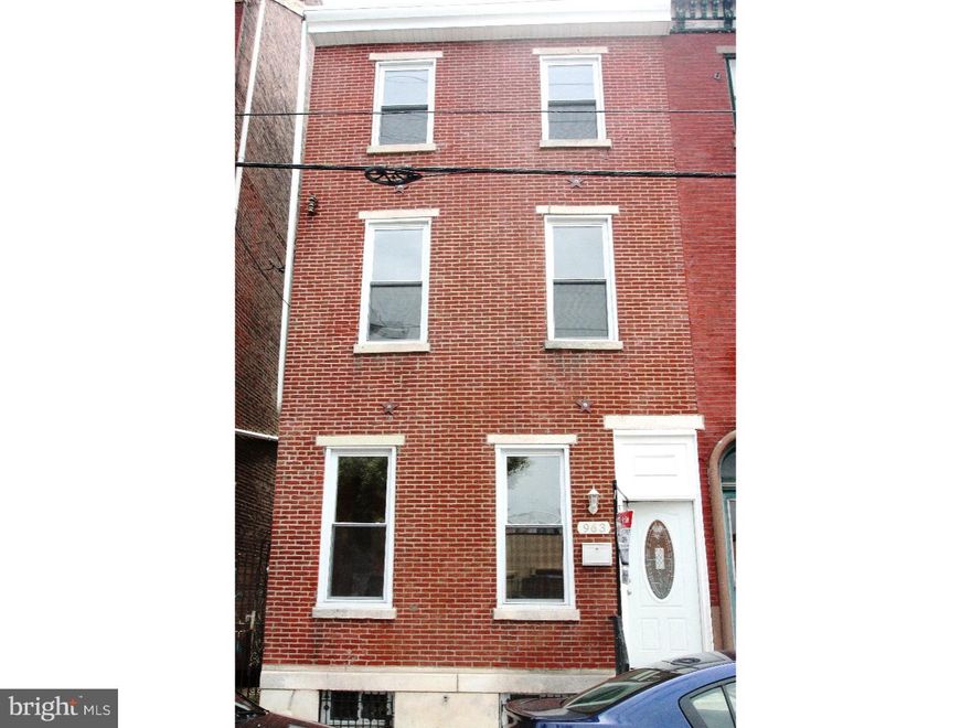 An extraordinary renovation is found in this 3 story home, featuring 3 impressive master suites! A handsome brick facade gives way to a well designed home with beautiful hardwood floors throughout. Foyer entry leads to the living room with a decorative fireplace, mantle, exposed brick chimney, and convenient powder room. The brand new kitchen has ample storage, stainless steel appliances, granite counters, tile backsplash and a breakfast bar that leads to a large dining room.  The kitchen and dining room are flooded with light from 3 windows and a set of French doors that  lead to a sunny patio and fenced in rear yard, perfect for entertaining.  An impressive winding staircase leads to the upper floors with 3 impressive master bedroom suites! Each features a walk in closet and newly renovated en-suite bathroom. Gorgeous hardwood floors throughout, a sizable basement with laundry, and central air conditioning will help you live comfortably in this wonderful townhouse!