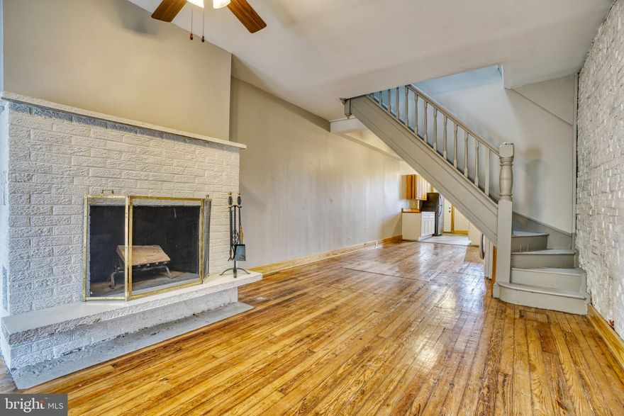 This convenient and charming 2 bedroom, 2 bath rowhome sits at the heart of the Barclay neighborhood, offering easy access to commuter routes, major employers, restaurants, shopping and downtown Baltimore.   The main level boasts abundant natural light and hardwood floors, complemented by a charming brick ornamental fireplace that adds elegance. The open living room and dining room seamlessly transition into the updated kitchen, featuring soft-close cabinetry, stainless steel appliances, subway tile backsplash, granite countertops, with access to a fenced yard.   There is also an in unit,  first floor laundry.
Upstairs, you'll find two bedrooms, one ensuite and one which would access the hall bath. Both bedrooms have ample storage space and with two bathrooms, it's perfect for roommates or families. One bathroom includes a tub and the other has a custom-tiled walk-in shower.  
If you need more space, there is plenty of storage in the unfinished basement. 
Major commuter routes such as I-95, US-40, and I-83 are easily accessible, and it is just a short distance to Penn Station, Station North, Charles Village, Mount Vernon, Downtown, Johns Hopkins University, Union Memorial Hospital, Baltimore Museum of Art and much more.
The owner is looking for tenants with 650 credit and $5,250/month income. Pets are considered on a case-by-case basis with a pet rent. It is available 11/05/2025. Contact listing agent or your favorite Realtor to schedule an appointment.