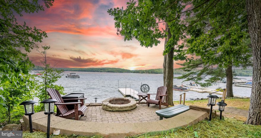 UPDATED PHOTOS COMING SOON 
Looking for your exclusive getaway on the lake?  Or maybe you’d like to supplement your Deep Creek experience with rental income? You can have it your way at Ahh Chalet.  You will love everything that makes this established Deep Creek rental a year-round favorite: lake & mountain views, central location, and multiple gathering areas inside and out. Walk to ice cream, marinas, and the lake’s top restaurants, with groceries, Wisp, and the State Park just 5-10 minutes by car. Lovingly maintained with yearly improvements focused on guest comfort and low maintenance.  Top it off with a lakefront right out your door, covered hot-tub overlooking the lake, landscaped firepit near the shoreline, and your own private deep-water dock ... you and your crew will be delighted.