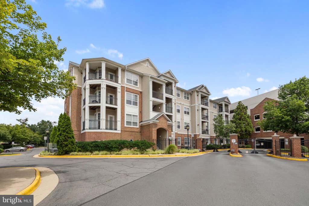 Photo of 12909 Centre Park Circle #104, HERNDON, VA 20171 (MLS # VAFX2332194)