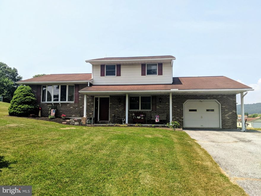 Enjoy beautiful mountain views relaxing in your sunroom, or entertaining in the large yard, in this 3 story split level with a full basement.  This home sits right across the golf course and offers 2 bedrooms, 2 1/2 bathrooms, living room and spacious family room perfect for entertaining.  Kitchen offers a breakfast bar and there is a deck off the dining area perfect to grill on in the evenings.   Enjoy the oversized one car attached garage and detached 12x24 shed/garage perfect for storage.  The sellers have taken very good care of this home and it has been very well maintained.  Living room could be converted to a 3rd bedroom if desired.  Home is move-in ready!  Conveniently located to stores, restaurants and easy access to major highways.  Schedule a private tour today!