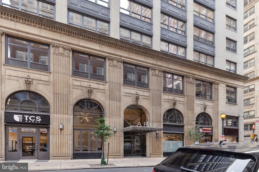 PRICE REDUCTION!! Come experience luxury urban living in this spacious 1-bedroom + den, 1- bathroom unit in Rittenhouse’s boutique Aria Condominium. With an unusually large 969 sq ft layout, this corner unit has West and North views that emanate ample natural lighting.  Enjoy city views, a chef’s kitchen, versatile den, a huge bedroom with spacious closet, and an in-unit Bosch washer/dryer.  The large living space connects to the kitchen through an open bar, perfect for entertaining. The comfortable lobby area has been recently redecorated, and the prime location of the building affords access to offices, shops, dining, museums, universities, and transit.  Visit the Aria with its fitness center, resident lounge, pet spa, yoga studio, guest suite, AND what may set it apart from other buildings, the 24-hour concierge and large team that provide “over the top” service to the residentsThere is a current special assessment for required capital improvements to the building’s facade. The seller will be responsible for this assessment in full prior to closing. Buyer will have no cost for these improvements.