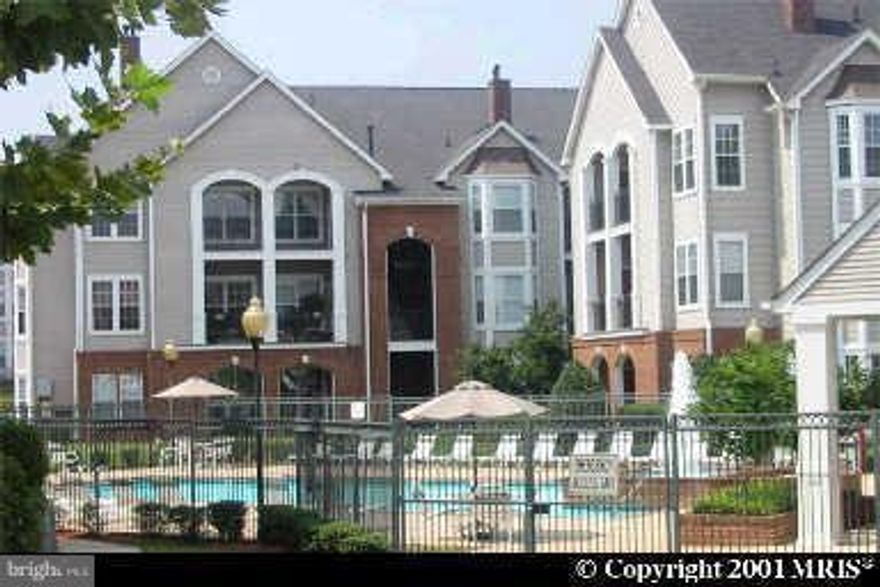 Stunning! Outstanding design & community.   Larger than other two bed rms.   Huge Private balcony    9' ceilings,    Bright  bay window plenty of closet space,   Walk-in closet, additional storage, full size washer dryer.   Perfect mid-level plan.  Amenities galore inc. Swimming Pool & Algonkian Regional Park! Marble fireplace for cozy winter nights  -  Water & trash included -  don't delay