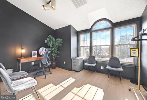 Photo of 8305 Cherry Lane #10, LAUREL, MD 20707 (MLS # MDPG2186636)