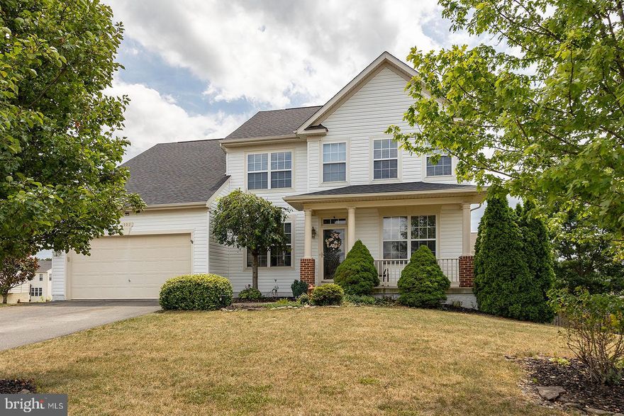 This stunning Colonial home is located in the desirable Wakeland Manor community, offering a comfortable and spacious living environment. With over 3,400 square feet of finished living space, this 5-bedroom, 3.5-bathroom home provides ample room for relaxation and entertainment. As you approach the property, you are greeted by a charming covered front porch, perfect for enjoying your morning coffee or watching the sunset. The fenced backyard features a deck and a patio.  A storage shed offers convenient storage for your gardening tools and outdoor equipment. Step inside, and you'll immediately notice the beautiful hardwood floors throughout the main level, adding warmth and elegance to the home. The living room features an electric fireplace, creating a cozy ambiance . The kitchen boasts gas cooking, tile floors, an island, and a pantry, providing the ideal space for preparing meals and entertaining. Adjacent to the kitchen is a separate dining room with chair railing, adding a touch of sophistication to your dining experience. Convenience is key with a main level laundry room! The upper level of the home features a spacious primary suite with a tray ceiling, offering a luxurious retreat. The primary bathroom includes a soaking tub, a separate shower, and double sinks, providing a spa-like experience. Additionally, there are three more well-appointed bedrooms on this level. The finished basement adds even more livable space. It features a fifth bedroom and a full bathroom with Pergo flooring, perfect for guests or as a private office. The recreation room offers a built-in bar, refrigerator, and microwave, making it an ideal spot for entertaining . There is also a den that can be used as a home office, study, or playroom. The walk-out level basement provides easy access to the backyard. 
NEW GARAGE DOOR 8/2023, NEW ROOF 2019, NEW A/C 2020, furnace & water heater maintained and inspected, REPLACED kitchen COUNTERTOPS and SINK in 2021. Cabinets in garage.
 Residents of the Wakeland Manor enjoy access to amenities such as an outdoor swimming pool and a community clubhouse, basketball & tennis court perfect for staying active and socializing . See attached video! Also, this home is located just minutes from 330+ acres of Sherando Park with hiking, walking & multi-use trails, mountain bike park, disc golf course, 4.5-acre lake, 25-meter pool, and High School. See attached video! 
 Glo Fiber and Comcast are available.