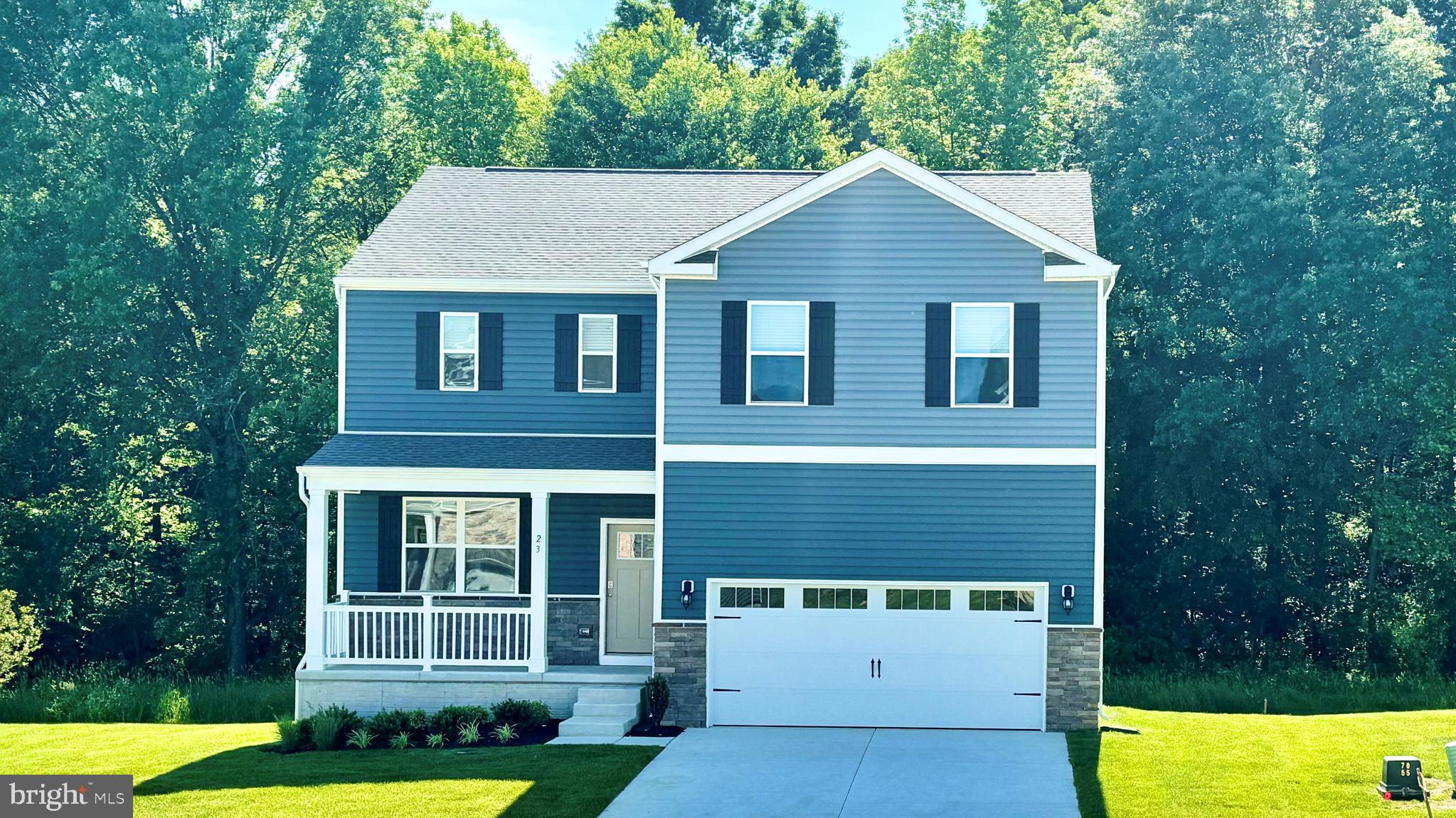 Welcome to 53 Buttercup Circle, a new home in Elkton, MD, located in the community of Barksdale Crossing! One of the last remaining homes available in our community situated on a private home site backing to wooded area! The Galen is a spacious 2,969 square foot two-story home that offers five bedrooms, three and a half bathrooms, a flex room, 9’ ceilings, and a two-car garage.
This well-designed home has an inviting foyer that is open to the functional flex room that can be used as an office, playroom, or formal dining space. The well-designed gourmet kitchen features modern white cabinetry, beautiful quartz countertops, an oversized corner pantry, a spacious island with additional room for seating, and stainless-steel appliances. The kitchen flows seamlessly into the dining space and the sizeable great room. The first floor also offers a powder room, coat closet, and storage area.
As you make your way up the stairs that are nestled in the corner of the great room you will find a vast landing. The impressive owner’s suite boasts an expansive bedroom, a huge walk-in closet, and a contemporary owner’s bathroom with a large shower. Three generously sized secondary bedrooms, a spacious hall bathroom with double vanity, and the conveniently located laundry room complete the upstairs.
This home includes a finished basement with a recreation room, bedroom, and bathroom. The Galen also includes a white window treatment package, an upgraded interior trim package, a fully sodded, irrigated, and landscaped yard, and the exclusive Smart Home® Package through ADT giving you complete peace of mind living in your new home.
Pictures, artist renderings, photographs, colors, features, and sizes are for illustration purposes only and will vary from the homes as built. Image representative of plan only and may vary as built. Images are of model home and include custom design features that may not be available in other homes. Furnishings and decorative items not included with home purchase.