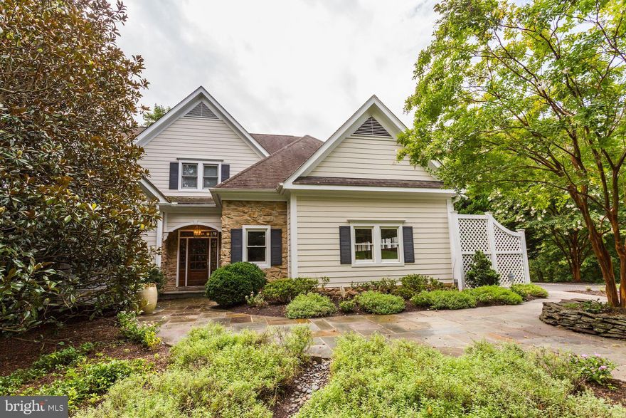 Price improvement !!  Gorgeous 6552 sq ft Custom 5 BR 5BA Colonial on large picturesque lot backing to parkland and steps to the C&O Canal. Dramatic Open Spaces!Perfect house for ENTERTAINING!  Views from every Room! Kit,Fam Rm,&Great Rm all open to huge Deck & Yard. 20' Ceilings, Library,W/O lower level w Au Paire/Mom-in-law Suite, On Quiet Part of MacArthur. Very Zen. Open SUN 2-4.