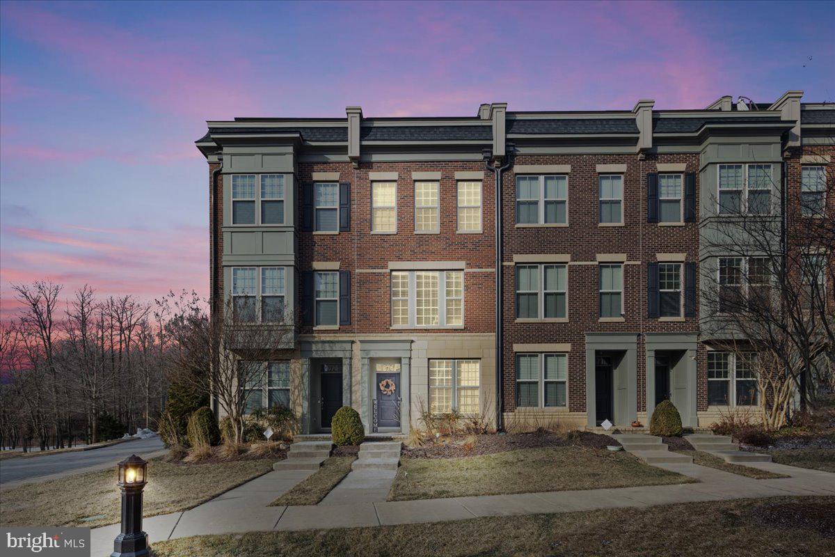 HUGE PRICE IMPROVEMENT - $35,000! This coupled with 100% financing is unbeatable!
This home qualifies for 100% financing PLUS a $5,000 GRANT! Credit Score requirement is 620+. OR VA buyers can take advantage of a VA Loan Assumption at 5.5%! Just Ask!
Welcome to the Integrity Homes Seneca Model, one of the most affordable homes in the premier gated community of Potomac Overlook! This luxurious 4-level garage townhome offers an incredible lifestyle with water access, upscale amenities, and prime location at National Harbor, all without the hefty price tag. With new construction homes selling in the $950s, this home is truly an unbeatable opportunity.
GROUND/GARAGE LEVEL: Upon entering the home, you are greeted by a hardwood foyer in the bright and spacious above-grade basement or garage level. This floor features a full bedroom with an ELFA closet system, a full bath with a tiled floor, seated shower, and plenty of natural light. This space is ideal for guests, in-laws, a private office, or even a home gym. The garage is equipped with a Chamberlain myQ WiFi system, allowing for smartphone-controlled access, and includes built-in overhead storage for added convenience.
MAIN LEVEL: Ascending the elegant hardwood stairwell with upgraded iron spindles, you’ll arrive at the main level, where luxury and function merge seamlessly. The gourmet kitchen is a chef’s dream, featuring WiFi-controlled dual ovens, a 5-burner gas grill-top stove, 42-inch mahogany cabinets with silver hardware and glass inlays, granite countertops, a coordinating backsplash, and a spacious breakfast bar for those meals on the go. The double-sided remote controlled gas fireplace adds warmth and sophistication, acting as a tasteful partition between the living and dining areas. Dimmable recessed lighting and large windows fill the space with natural light, while gleaming hardwood floors add to the home’s elegance. A must-have powder room completes this level for convenience.
THIRD LEVEL: On the third level, the primary suite offers a tranquil retreat with an oversized seated shower, dual closets, dual vanities with granite countertops, and extra built-in storage. The laundry closet is conveniently located on this floor, complete with a front-load washer and dryer. This level also includes a flexible common area space with a huge walk-in closet, perfect for use as a fourth bedroom, home office, cinema room, or fitness area.
FOURTH/LOFT LEVEL; The fourth or loft level is designed for both relaxation and entertainment. A private bedroom with a cozy window seat and a full ensuite bathroom makes this floor feel like a personal getaway. The highlight of this level is the entertainment lounge, complete with a wet bar, wine/beverage cooler, storage cabinets, a sink, and a dishwasher. The second double-sided gas fireplace adds a touch of elegance, while direct access to the private rooftop deck makes this space perfect for hosting guests or enjoying quiet evenings under the stars.
This home is equipped with modern technology and smart features throughout, including HDMI wiring, CAT5E network access, a home sound system, a Ring doorbell, and digital door handles on nearly every door. With soaring 9Ft+ ceilings and thoughtfully designed spaces, this home is as functional as it is beautiful.
Located in National Harbor and just minutes from Washington DC, Alexandria, and major commuter routes, this home offers unbeatable convenience. Enjoy dining, shopping, and entertainment at MGM, Tanger Outlets, and Top Golf, or explore the nearby water docks and piers. With so much to offer at this price, this home won’t last long. Schedule your private tour today and experience the best of Potomac Overlook living!