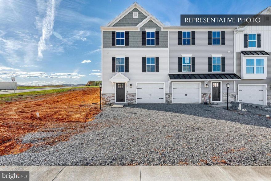 For a limited time, receive $7,500 in Flex Cash on select standing inventory closing on or before April 30, 2026—an exclusive incentive designed to support your purchase. See Agent for details.

Welcome to this beautifully upgraded end‑unit Iris plan in Elizabeth Village, offering modern style, thoughtful design, and low‑maintenance living with an anticipated March completion. The bright, open main level features the Alternate Kitchen Package with upgraded cabinets, quartz countertops, tile backsplash, stainless‑steel gas appliances, and a full recessed lighting package. EVP flooring runs throughout the main living areas for a warm, cohesive look, complemented by two bay windows that add natural light and architectural character. Upstairs, the Primary Suite provides a relaxing retreat with a double‑bowl vanity, quartz vanity top, raised‑height cabinetry, a semi‑frameless shower door, and upgraded plumbing and lighting fixtures, while the hall bath includes an upgraded vanity with cultured marble top and coordinated hardware and lighting. Additional interior enhancements include two‑tone interior paint, a media chase, reinforced light‑fixture locations, and upgraded lighting at the kitchen island, breakfast room, powder room, hall bath, and primary bath, with EVP flooring continuing into the primary bath and upgraded vinyl in secondary bath areas for added durability. Outdoor features include a 10×10 composite deck with steps to grade, a garage door opener with wireless/keyless entry, and an Encode Smart Deadbolt on the front door, while the Partial Underground Basement Package provides natural light and flexible storage or future finishing options. This home also includes a 10‑Year Transferable Structural Warranty for added peace of mind. Photos may show options not included in this home. Taxes are estimated; final assessment and taxes will be determined by the county after settlement. Elizabeth Village offers convenient access to shopping, dining, and commuter routes—an ideal blend of comfort, convenience, and modern living.