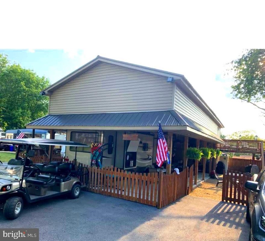 Wait until you see this property! It comfortably sleeps 17 people, perfect for the whole family. The property features a 2-bedroom fifth-wheel with an amazing 2-story bunkhouse. The bunkhouse boasts 6 bunk beds and a deck. The downstairs has a large, adaptable room that can serve as another bedroom, a private suite, or an office – customize it to your liking! This lot includes a full-size water heater, public sewer, a fenced-in yard on a tranquil street, and a beautiful, private patio. This is a turn-key lot, and the motivated sellers are open to offers.

 *** This is a gated community so you need to enter at the guard shack. Entry is not permitted without ID per the office rules. Bring ID's to the office or guard shack for visitor pass. THIS IS A SEASONAL CAMPGROUND! OPEN FROM APRIL 1 TO NOVEMBER 1. ** WELCOME TO RIVER BEND/SEASONAL LOT AVAILABLE TURN KEY** River Bend is a privately owned 400 acre recreational- vehicle camp resort with seasonal activities for members, families and guests. This great RV park is tucked away on the Upper Potomac River of West Virginia, River Bend is one of West Virginia's most popular family seasonal destinations. . Just a short drive from the Washington and Baltimore metro area. Open with utilities from April 1 to November 1. Lot owners have access to their property the entire year. *** Members Enjoy *** * Amazing views and wildlife, Potomac River access, Trails, Swimming pools, Mini-Golf, Youth center, Tennis and basketball courts, laundry facilities, convenience store, deli and lounge. *Bath houses through out the park, boat ramp, bar and grill and even a church located on the grounds. River Bend also hosts numerous activities such as 4th of July fire works, small carnival, bonfires, poker runs, horse shoe tournaments, car show, Halloween Trick or Treat and so much more. Come and check out this amazing lot **** Lets bring an offer to to table!