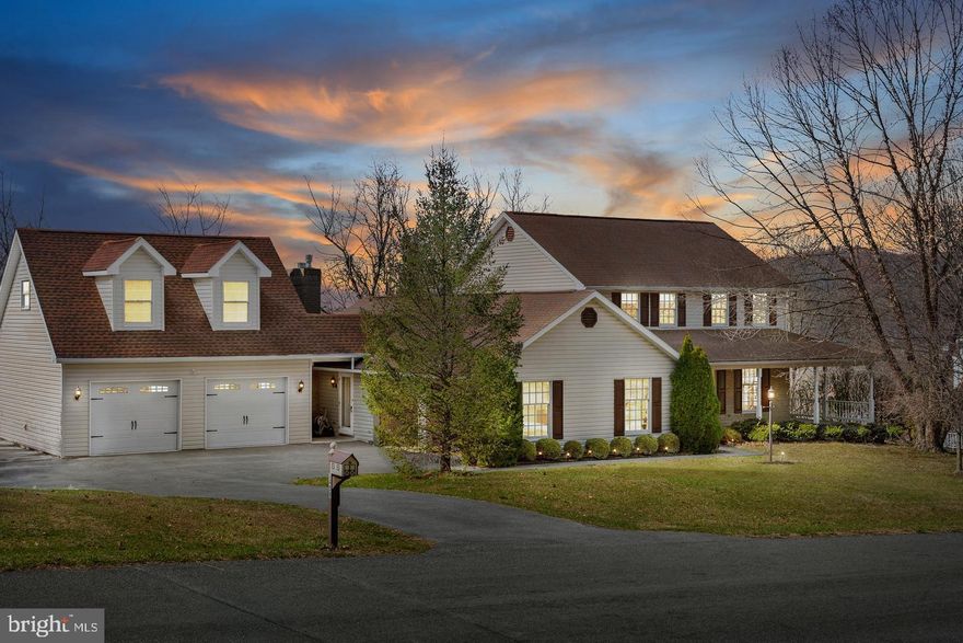 Room for everyone! This well-maintained 5BR/3.5 bath home sits on a quiet dead-end street with beautiful mountain views. Offering over 3,800 sq ft of finished living space, it features updated kitchen and baths, a new heat pump (Dec. 2025) with two zones, gas backup on the main level, and water heaters updated in 2023.
Thoughtfully designed, the home includes extra garage space, a lower level with a rec room, office, and walkout to the patio, plus a cedar-lined hobby room and ample storage. The detached 2-car garage addition includes unfinished flex space above with electric, water, phone, and cable already run. Below, a 12’x25’ workshop with benches, shelving, and air compressor is ready for projects.
A deck expansion (2010) with low-maintenance Trex (2025) is perfect for enjoying the serene setting and mountain views. Irrigation system included. With generous space, major updates, and versatile indoor/outdoor areas, this home blends comfort, function, and scenic charm—ready for its next owners!