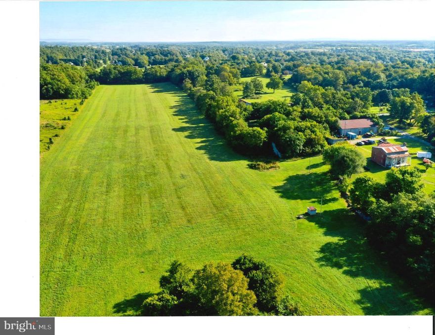 Discover a rare 29± acre land opportunity on Elliott Drive, offering exceptional development, investment, or estate potential. This property includes one large parcel plus four additional lots of approximately 0.92 acres each, providing flexibility for subdivision, residential development, or a private homestead. Public utilities are accessible, adding value and convenience for future use. Existing home and outbuildings are included, except for the mobile home, and conveyed as-is, where-is, and are not available for viewing, making this an ideal option for buyers focused on land value and future potential. With generous acreage, road access, and utilities nearby, this prime tract of land on Elliott Drive presents a unique opportunity for builders, developers, investors, or those seeking acreage in a growing area. *1.5 acres is excluded from sale around the mobile home.*