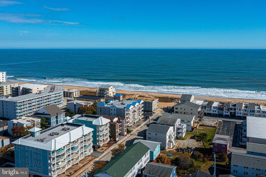 Must see this former builder model unit, professionally furnished and decorated by top designer in Ocean City. Unit has a new dryer and icemaker and boosts a 40K+ average rental income in the past 12 years. Excellent mid-town location, walk to shops and restaurants, minutes to downtown and boardwalk, well managed building. Second floor unit with great views of ocean and bay, oversized deck, nice open floor plan, unit has storage Locker by the unit’s front door. Building has secure lobby, Elevator and elevated pool on the pool deck. Great Ocean Side location,  steps to the beach.