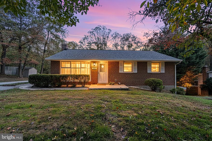 Welcome to 3803 Marriottsville Road — a beautifully updated full-brick raised rancher offering modern finishes and comfortable main-level living on a spacious 0.56-acre lot. Thoughtfully refreshed throughout, this 3-bedroom, 2-bath home combines classic charm with today’s conveniences.

Step inside to find refinished hardwood floors, fresh paint, and a bright open layout that flows from the living room into the dining area and kitchen. Spacious kitchen with ample cabinetry. 

The main level includes three well-sized bedrooms and an updated full bath. The full walk-out basement adds exceptional versatility, offering a large open space ideal for a recreation room, home office, fitness area, or future finished expansion. The lower level also includes a second full bath, laundry area, and direct yard access. 

Exterior features include a large double-wide driveway with plenty of parking, a full brick exterior for low-maintenance living, and a deep, private yard backing to mature trees—perfect for outdoor enjoyment. Recent updates include a new roof, new lighting, updated baths, and refreshed interiors throughout.

Conveniently located near commuter routes, shopping, and everyday amenities, this move-in-ready home offers space, comfort, and value on a generous private lot.