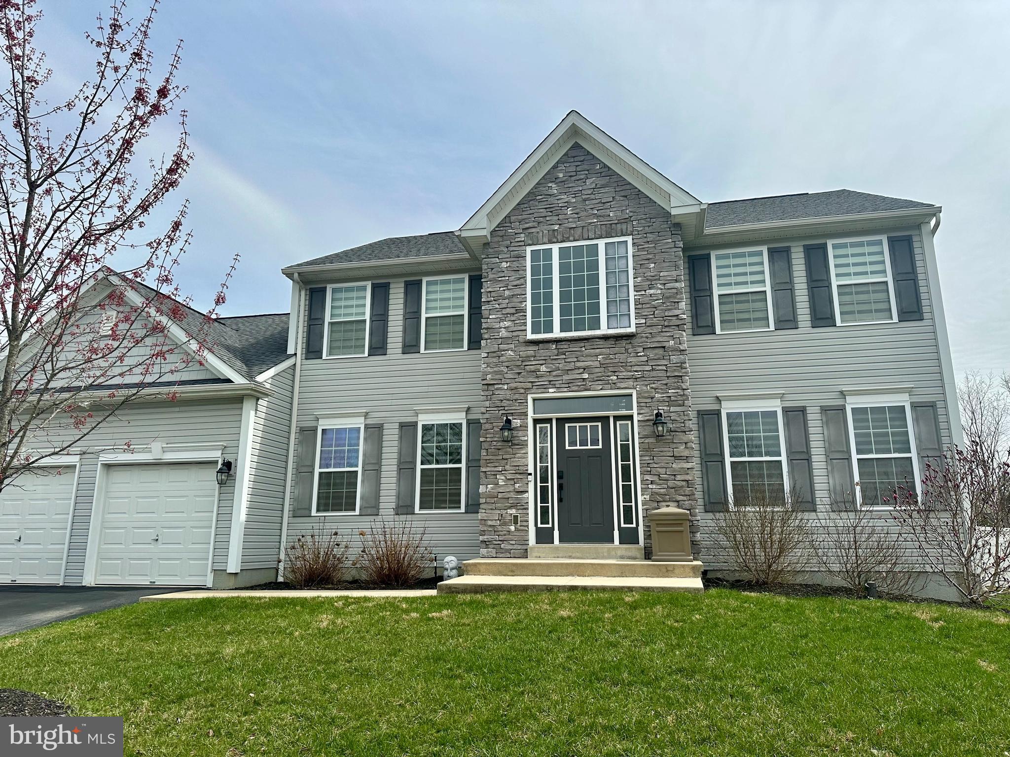 This contemporary and beautiful "Dominic" model is a spacious and open floor plan with large dining room, and a luxurious kitchen and breakfast area that opens to the oversized family room. The first floor also features a mud room area off the garage, powder room off the foyer area, and a beautiful bonus study or office area. The second floor boasts an extra-large master suite with master bath, tile shower area and double sinks in the bath; and walk-in closet. Three additional bedrooms, full hall bath and large laundry room complete the second floor. The finished basement provides additional living space making it the perfect home to entertain in.
Professional pictures are scheduled.