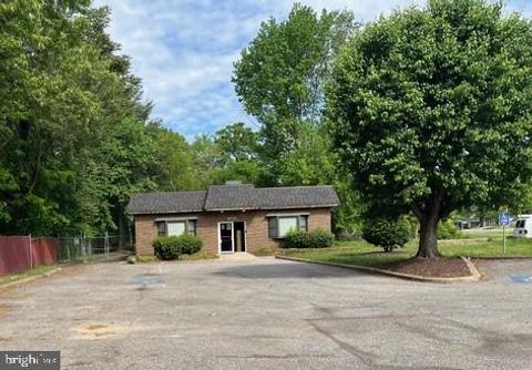 Photo of 6715 Suitland Road, SUITLAND, MD 20746 (MLS # MDPG2196020)