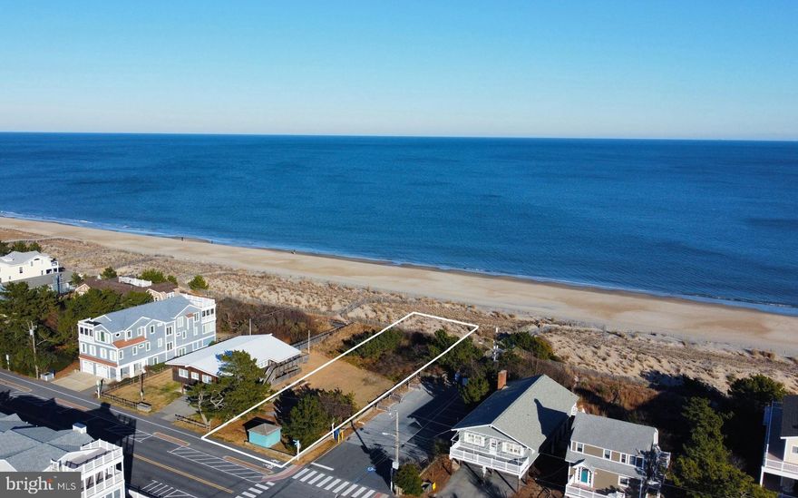 Oceanfront 50’ x 260’ corner homesite in the heart of Bethany Beach.  Enjoy panoramic ocean views and direct beach access just steps from your door, with an adjacent dune crossover providing safe, easy passage to the surf. This premier location offers the ideal backdrop for a sizable new oceanfront home, where sunrises, sea breezes, and the sound of the surf become part of everyday life. Positioned at the south end of town limits, yet within walking distance to downtown Bethany’s charming shops, restaurants, and boardwalk, this homesite combines the best of peaceful oceanfront living with in-town convenience.