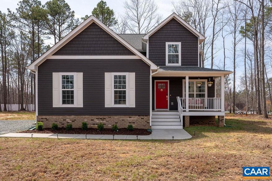 Built in 2023 and set on 1.5 acres, this nearly new home offers the benefits of modern construction with space to spread out. The large, level yard provides flexibility for outdoor living, recreation, or future plans, with a casual gathering area already in place for evenings outdoors. Inside, engineered wood floors run throughout the main level, anchoring an open floor plan that allows for flexible furniture placement. The kitchen centers around a substantial island with room for stools, highlighted by vintage French pendant lighting, painted white cabinetry, custom tile backsplash, stainless appliances including a French door refrigerator, and a large walk-in pantry. A bright dining area sits adjacent to French doors leading to the rear deck, creating an easy flow for outdoor dining and entertaining. A side-loading two-car garage opens to a practical landing area with a large closet for everyday storage. Upstairs, all four bedrooms are generously sized, including a spacious primary suite with walk-in closet and double vanities. The laundry room is located on the bedroom level, and pull-down attic storage adds convenience. Firefly fiber internet available, with easy access to I-64 and approximately 20 minutes to Charlottesville.,Quartz Counter