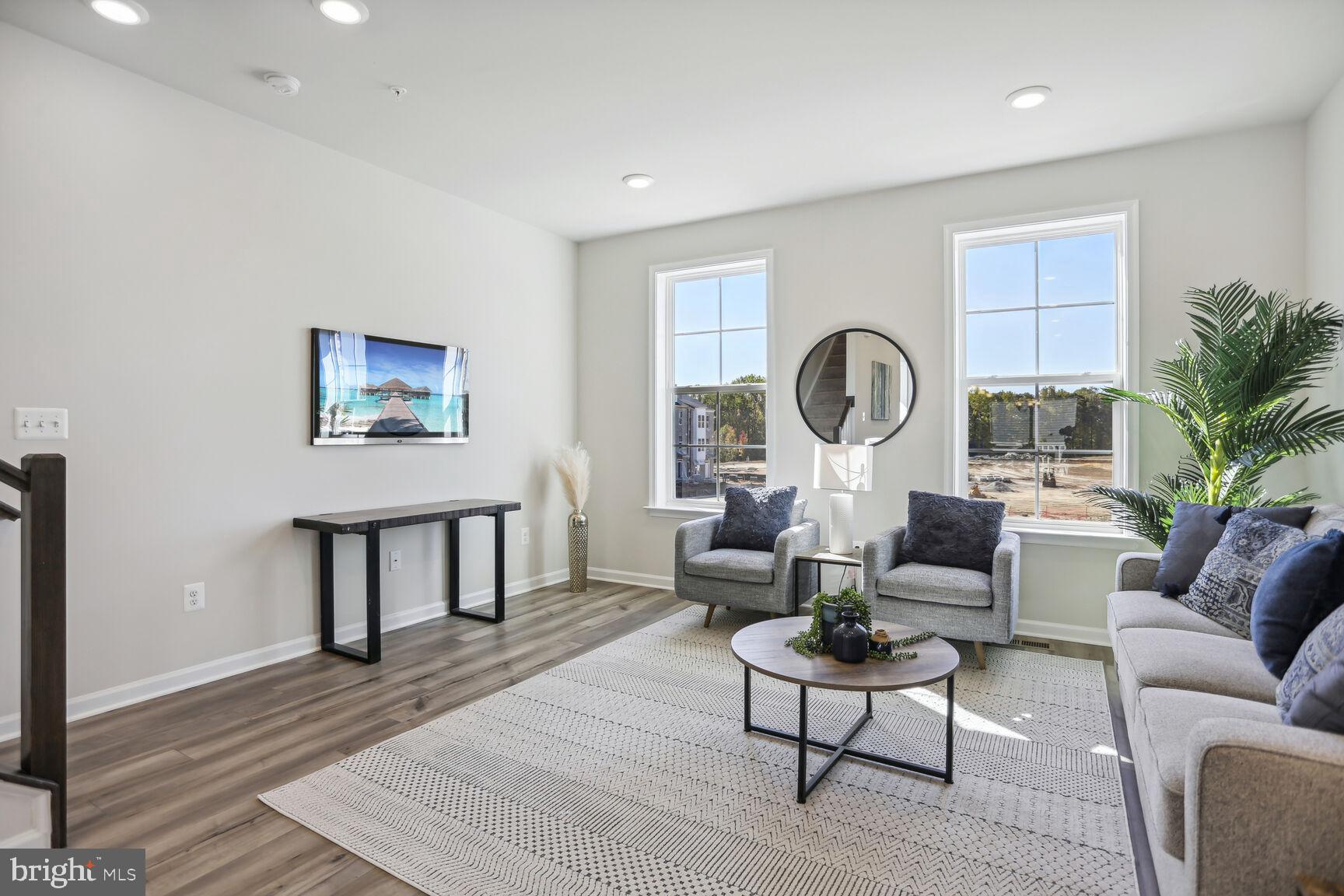 **OFFERING UP TO 37K IN CLOSING ASSISTANCE WITH USE OF PREFERRED LENDER AND TITLE.** Ask about additional incentives for QMI homes!
Alden II – Finished 3-Level Garage Townhome. Welcome to the Alden II, where thoughtful design meets modern luxury across three fully finished levels! Enter through the main entryway or enjoy the convenience of the attached 1-car garage, offering secure, weather-protected access to your home. Main Level is designed for entertaining, the open-concept kitchen is the heart of the home, flanked by large dining and family rooms that flow effortlessly together. Second Level includes luxurious primary suite, complete with spacious primary bedroom, separate walk-in closets, ensuite bath featuring dual vanities, private water closet, and a seated shower, a secondary upper-level bedroom and conveniently located laundry room complete the top floor—just steps from the bedrooms! Lower Level is perfect for guests or multigenerational living, the lower level features a spacious bedroom and full bath—beautifully secluded for privacy. *Photos may not be of actual home. Photos may be of similar home/floorplan if home is under construction or if this is a base price listing.