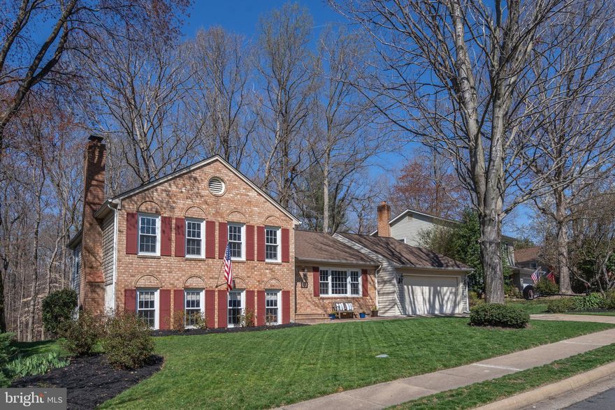 Open house canceled.In the heart of Lake Ridge sitting on a private lot that backs to trees,  You will find a meticulously maintained 4 bedroom 2.5 bath oversized 2 car garage! Updated gourmet kitchen with granite counter, upgraded cabinets, large pantry, and eat in area. Large picturesque window in the living room and formal dining over looking the private back yard. Over sized Master bedroom with two closets, one walk in with built in closet organizers and pocket door leads to the en suite. Sit outside on your private deck and enjoy your morning cup of coffee.  2 more bedrooms with updated plush carpeting and plenty of closet space share a full bathroom. Walk out lower level is waiting for you to entertain family and friends.  Family room with fire place, half bath, and 4th bedroom. The private backyard with large paver patio is sure to delight any nature lover. Easy access to I95, commuter routes, shopping, restaurants and so much more!