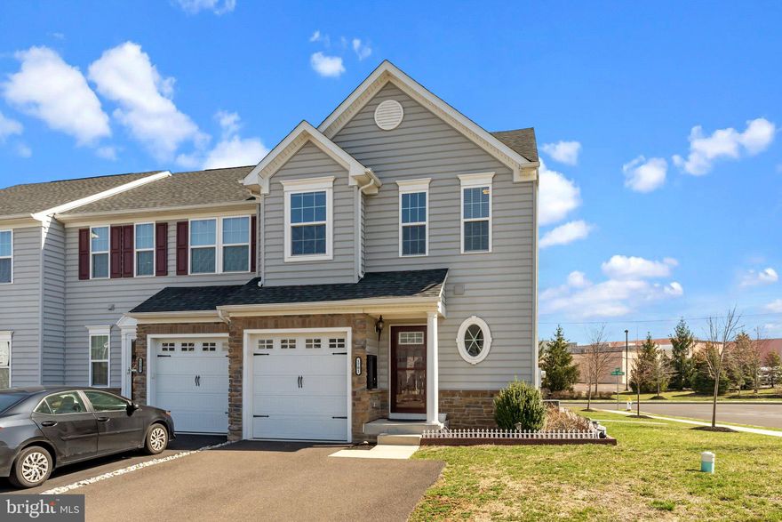 Property is under contract so the March 30th open house is cancelled. Welcome to this beautifully upgraded end unit townhome in the highly sought-after Montgomery Square community, located within the North Penn School District. Offering 3 bedrooms and 3.5 bathrooms, this home is filled with premium builder upgrades and modern finishes throughout. Upon entering, you’ll be greeted by refinished dark hardwood flooring (2024) and abundant natural light streaming through large windows. The welcoming foyer includes a coat closet, an updated powder room, and convenient access to the attached garage. The open-concept main floor is designed for both comfort and entertaining, featuring a formal living area with surround sound speakers. The heart of the home is the upgraded kitchen with an impressive 6-foot island, stainless steel appliances, and granite countertops. The original homeowner enhanced the space by expanding the dining room and adding a cozy sitting area off the back of the home — perfect for gatherings. Step outside to the expanded deck or take a peaceful stroll along the walking trail behind the development. Upstairs, the spacious primary suite includes a walk-in closet and an additional double closet, along with upgraded ceilings. The en suite bathroom features double sinks, a walk-in shower, and a linen closet. Two additional light-filled bedrooms also include walk-in closets and are serviced by a stylish hall bath. A convenient second-floor laundry room completes this level. The finished lower level offers versatile additional living space, ideal for entertaining or a home office or a playroom for kids, along with ample storage. Recent upgrades include a 21’ x 18’ expanded deck, new carpeting upstairs, fresh paint throughout (2024), custom wood paneling and wainscoting, a Tesla charger outlet, and designer window paneling. Conveniently located just minutes from the PA Turnpike for easy access to Center City and close to Hatfield’s fantastic restaurants, coffee shops, and food markets, this home is truly move-in ready! Don’t miss the opportunity to own this exceptional property — schedule your showing today!