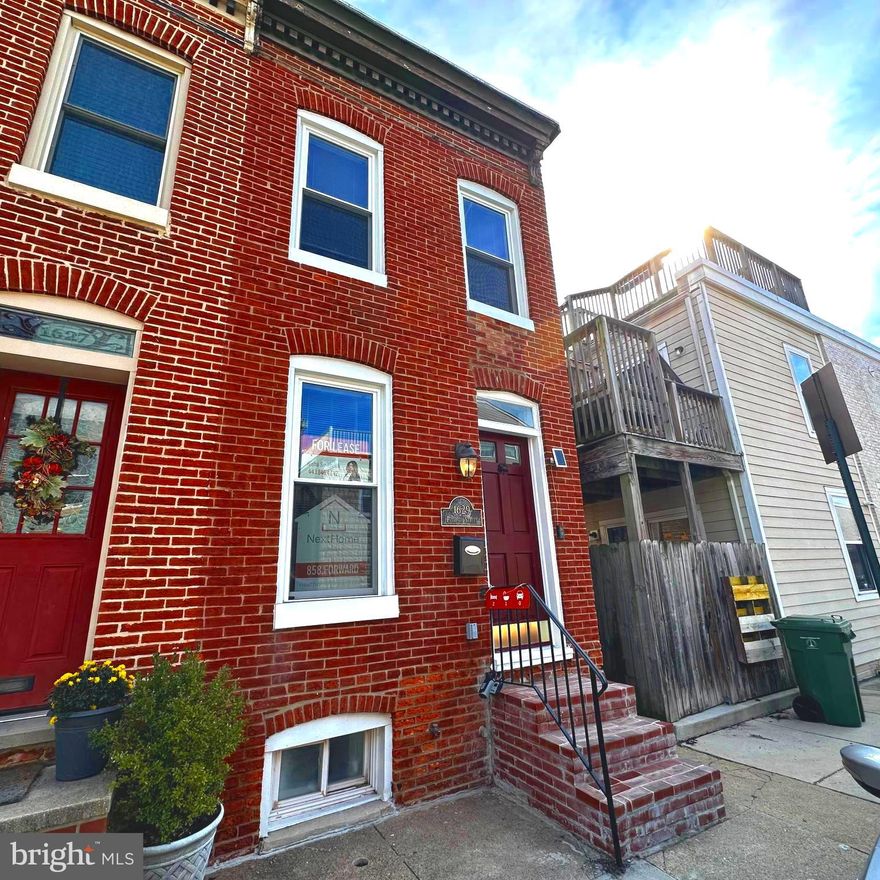 Charming End Unit in Federal Hill! This beautifully updated home blends modern style with classic Baltimore character. Featuring LVP and hardwood flooring throughout, exposed brick wall, and a bright, open layout, this home is move-in ready. The modern kitchen offers stainless steel appliances, quartz countertops, and ample cabinet space for all your culinary needs. The main level full bath is ideally located for convenience, perfect for guests, and everyday living. Upstairs, you’ll find two spacious bedrooms filled with natural light. Enjoy outdoor living on your private rear patio, great for relaxing or entertaining. The partially finished lower level includes a laundry area and flexible space for storage or a home gym. All this in the heart of Federal Hill, just steps from local shops, dining, and parks!