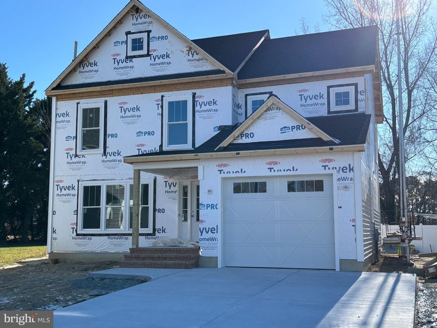 Nestled in the charming town of Easton Maryland, this exquisite new construction home, set to be completed in early 2026, will offer a perfect blend of modern luxury and traditional elegance.  The sixth of Sandy Lane's ten total homes to be built, this design is the first with two stories that include a first floor primary and two additional bedrooms up and a 320sf family room, providing a second spacious gathering place for tv watching, reading, homework, pool table, games, the works!  It is a thoughtfully designed custom layout providing plenty of space for privacy, relaxation and entertainment. As the construction progresses, you will step inside to discover an inviting open floor plan that seamlessly connects the gourmet kitchen to the dining and living areas. The kitchen as designed is a cook's dream, with an island providing ample workspace and seating for four.  The kitchen will be equipped with custom cabinetry and elegant countertops as well as high-end appliances. The kitchen island serves as a focal point for gatherings, while recessed lighting and ceiling fans enhance the ambiance throughout the home. The interior will be fitted with luxurious vinyl plank flooring and carpeting, creating a warm and comfortable atmosphere. The first-floor primary suite will feature a huge walk-in closet and a private, beautifully finished bathroom with a custom-tiled shower.  At the interior entrance to the garage, you will find a convenient, dedicated laundry room and private powder room.  Outside, the property will be equally impressive. The extensive hardscape and beautifully landscaped front yard will create a picturesque setting, with a rear patio and front porch perfect for outdoor entertaining or quiet evenings spent enjoying the neighborhood views.  In addition to an encapsulated and climate-controlled crawl space, the exterior features include energy-efficient double-pane windows, exterior lighting, and a well-designed gutter system, ensuring both functionality and aesthetic appeal. Parking is a breeze with an attached garage with car charger, driveway space for two vehicles, and additional on-street parking available. Located on a cul-de-sac, this home will offer a sense of privacy while still being in the heart of downtown, where the vibrant community life of Easton awaits.  You will experience the luxury of modern living in a prime downtown Easton location, where every detail has been meticulously crafted to provide comfort and elegance. Don't miss the opportunity to make this stunning residence your own and enjoy the exclusive lifestyle it will offer on Sandy Lane.  Sandy Lane homes are subject to recorded Covenants and Restrictions (attached in docs) but there is no HOA or fees.  Developer: Sandy Lane, LLC, MHBR 9512.  Builder: Stansbury and Sons Home Improvement Inc., MHBR 8351. BUILDER CONTRACT REQUIRED.