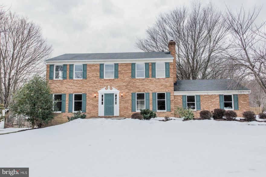 Perfectly upgraded brick front home features spacious interiors! KIT boasts new hardwood floors, new granite, new appliances, new cabs, breakfast area & access to large deck over looking pool, patio & fenced yard. Family room w/gas FP & refinished hardwoods. Expansive owner's suite w/WIC. ALL carpet is new, updated baths! Complete w/FIN walk-out LL w/bonus room w/built-ins & bath. Move-in ready!